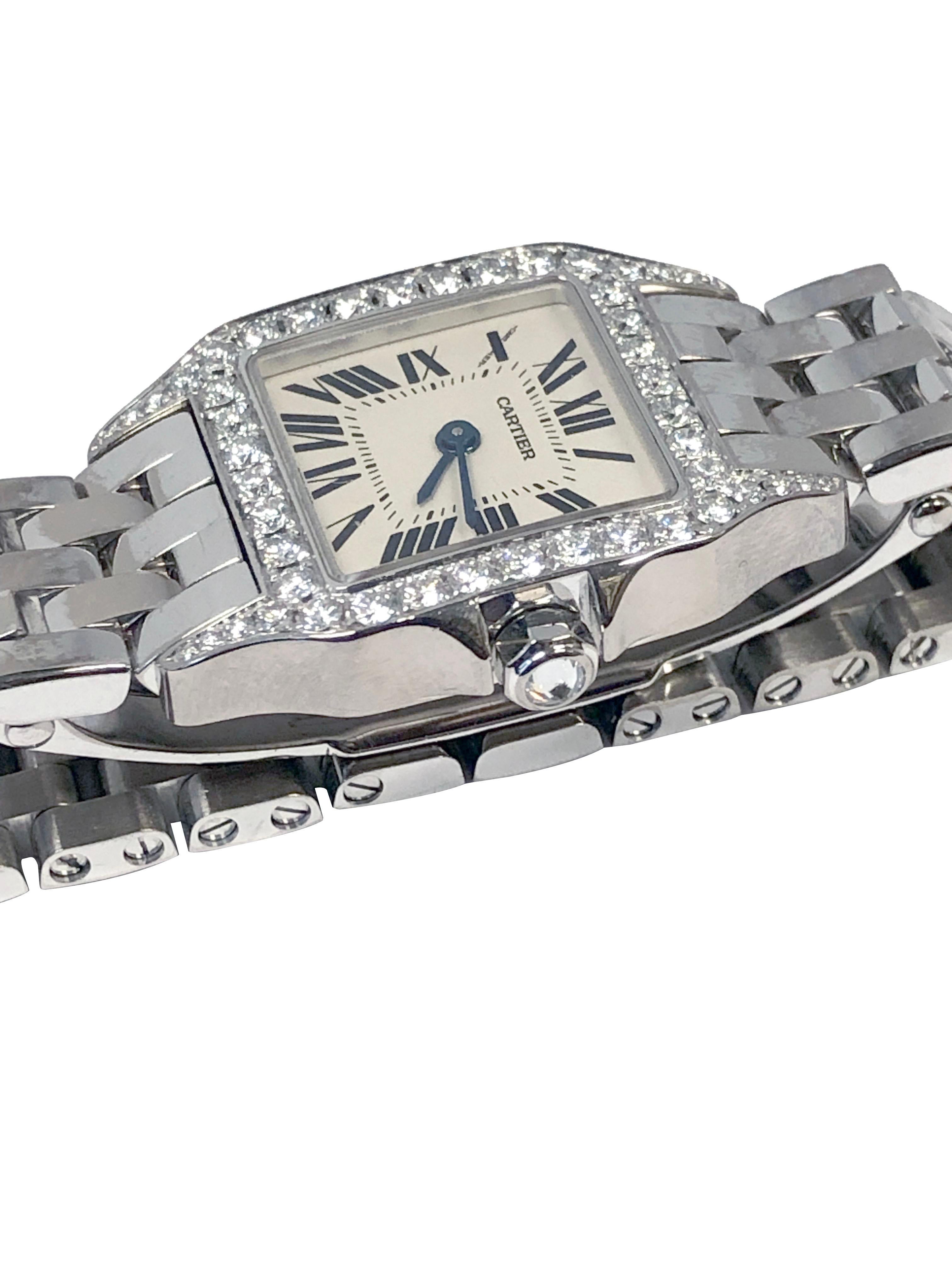 Circa 2020 Cartier Santos DeMoiselle Collection Ladies Wrist Watch, 20 X 18 M.M 18k White Gold 2 Piece case, Factory set Diamond Bezel and Lug Tops, Diamond set Crown, Quartz Movement, Silver-White Dial with Black Roman numerals. 7/16 inch wide