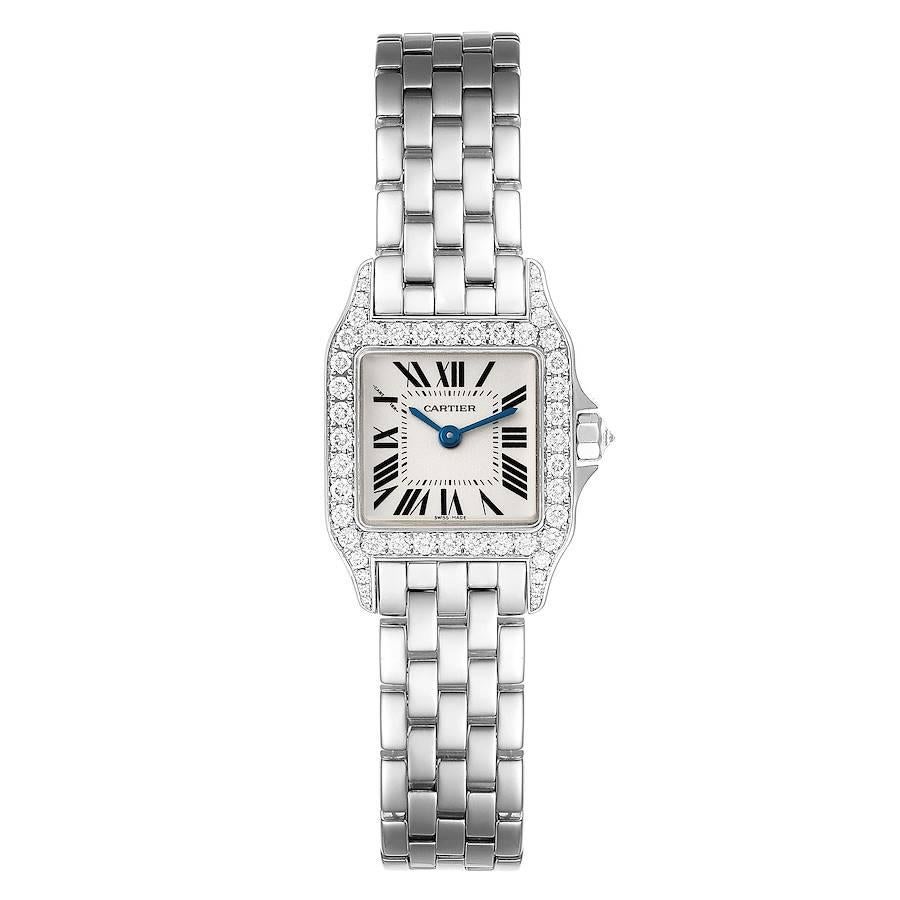 Cartier Santos Demoiselle White Gold Diamond Ladies Watch WF9003Y8 Box Papers. Quartz movement. 18K white gold case 21.65 x 28.25 mm. Octagonal crown set with the diamond. Diamond set lugs. Original Cartier factory diamond bezel. Scratch resistant