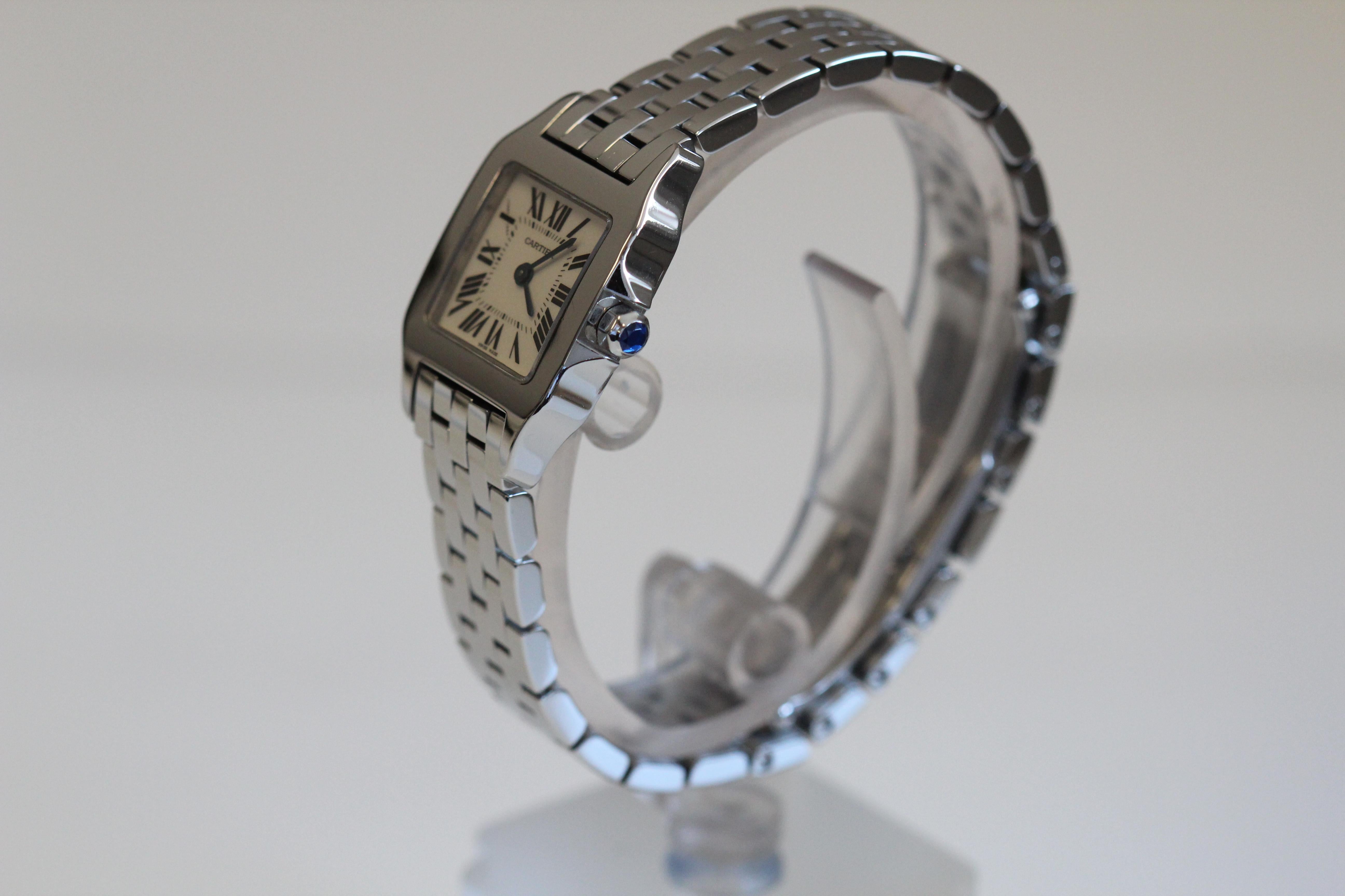 Watch Details: 

Cartier Santos Demosille W25064Z5 Stainless Steel Ladies

Model =   W25064Z5 

Wrist Size - Apprx 7 Inches

Case Size - 20mm without crown 23 with.

It is in Mint! Condition as seen in the photos

RZZA