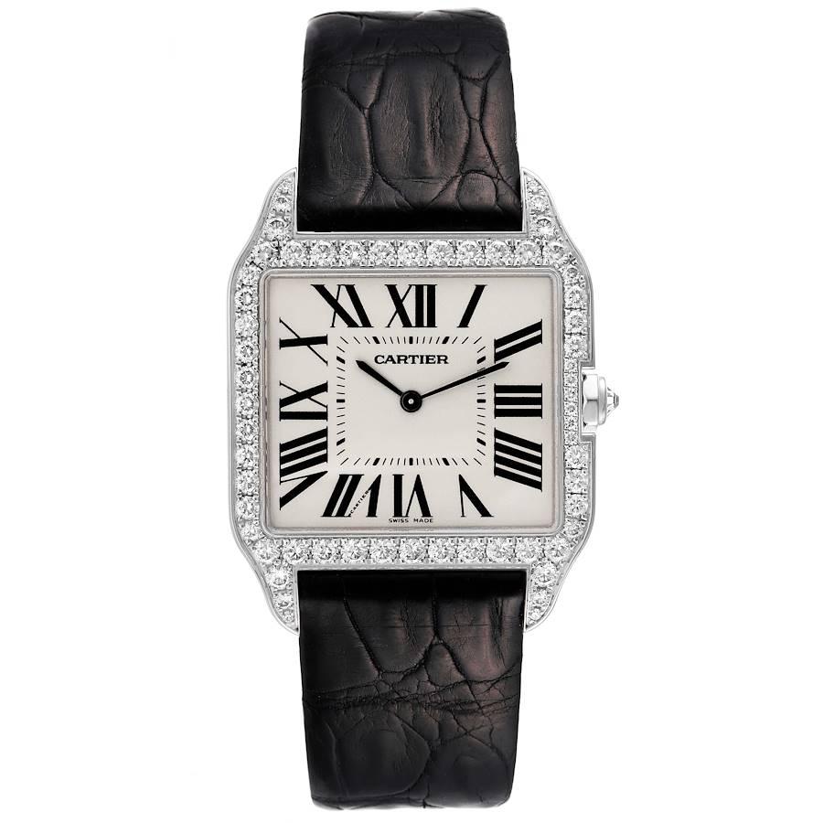 Cartier Santos Dumont 18k White Gold Silver Dial Mens Watch WH100651. Manual winding movement. 18k white gold case 44.5 x 34.6 mm. Circular grained crown set with diamond. . Scratch resistant sapphire crystal. Silver dial. Painted black roman