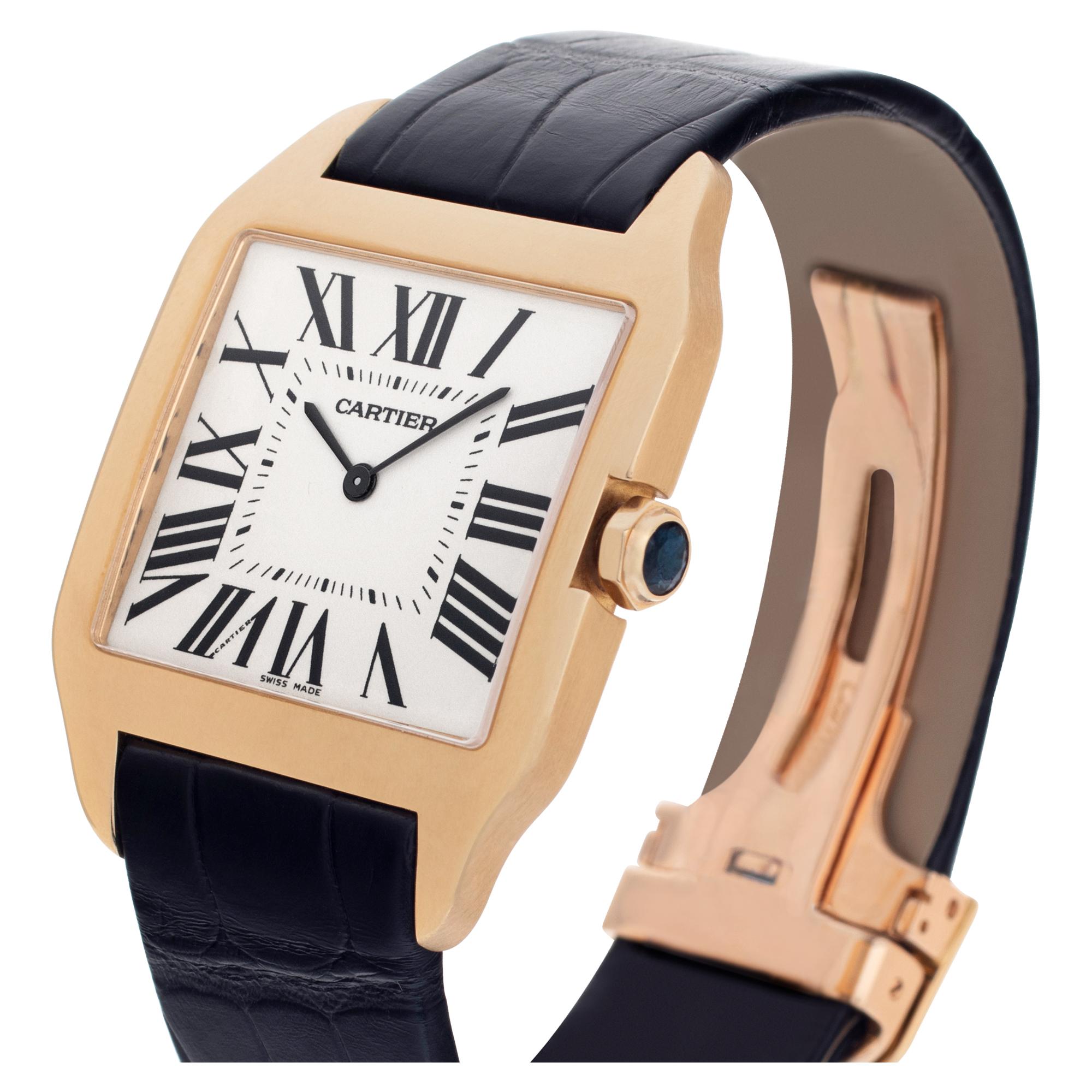 artier Santos Dumont in 18k on leather strap. Manual wind. 35 mm case size. Ref W2008751. Fine Pre-owned Cartier Watch.

Certified preowned Dress Cartier Santos Dumont W2008751 watch is made out of yellow gold on a Black Leather strap with a 18k