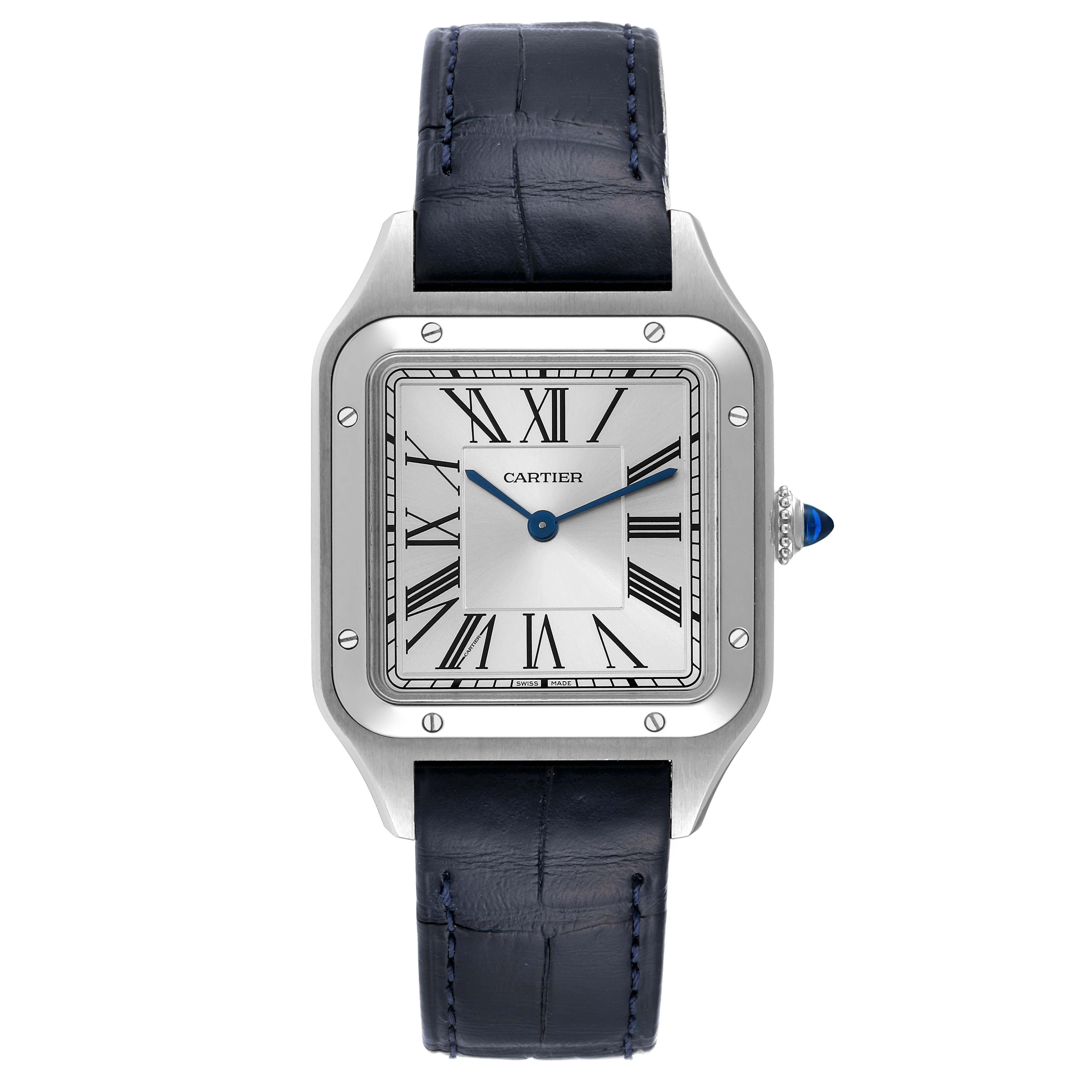 Cartier Santos Dumont Large Black Strap Steel Mens Watch WSSA0022 Box Card. Quartz movement. Stainless steel case 43.5 mm x 31.4 mm. Case thickness 7.3 mm. Circular grained crown set with blue spinel cabochon. Stainless steel bezel punctuated with 8
