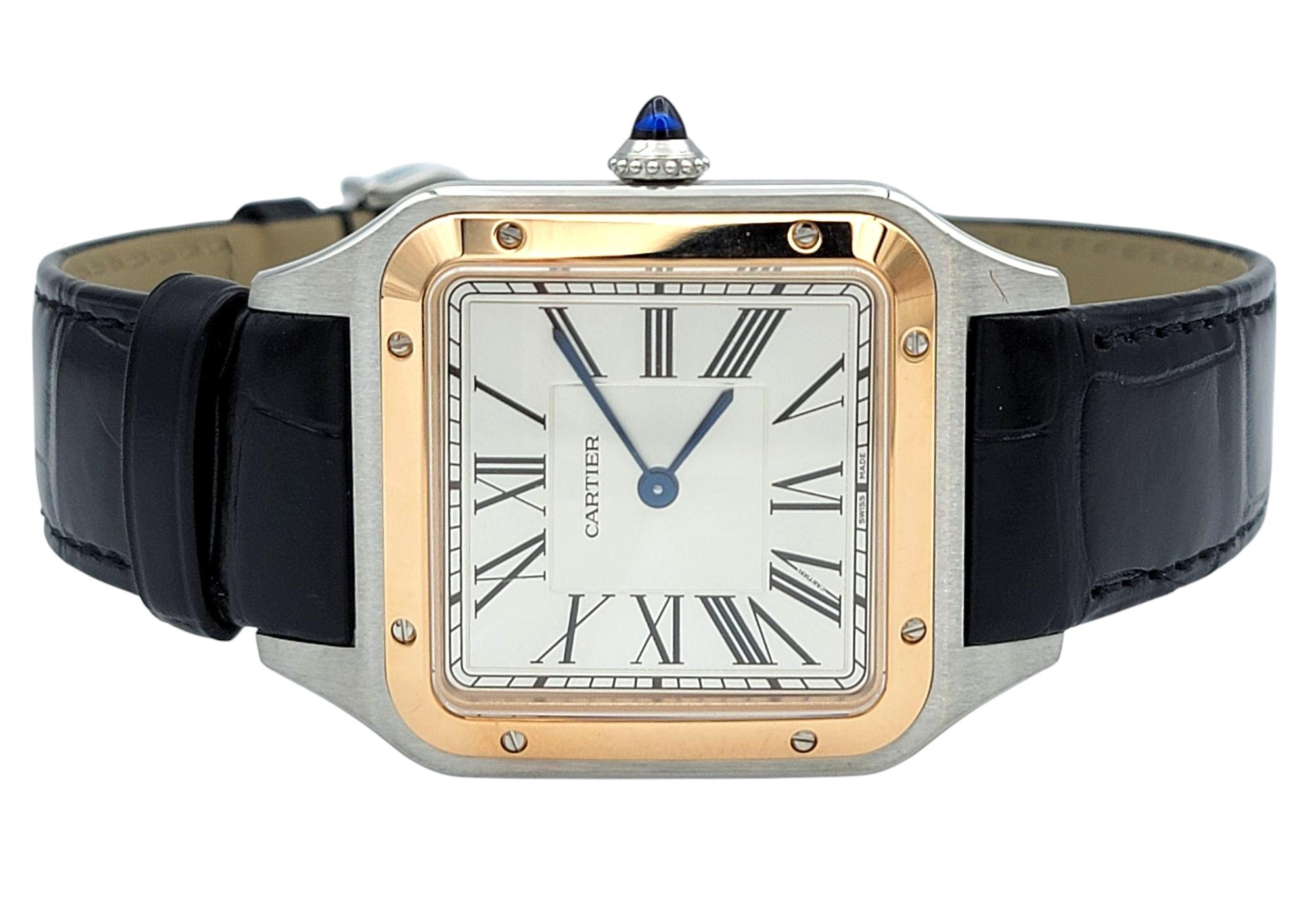 Timeless sophistication meets modern refinement in this Cartier Santos-Dumont watch. Featuring a sleek stainless steel case accented by an 18 karat rose gold bezel, this exquisite timepiece exudes understated luxury. The silvered sunray dial is