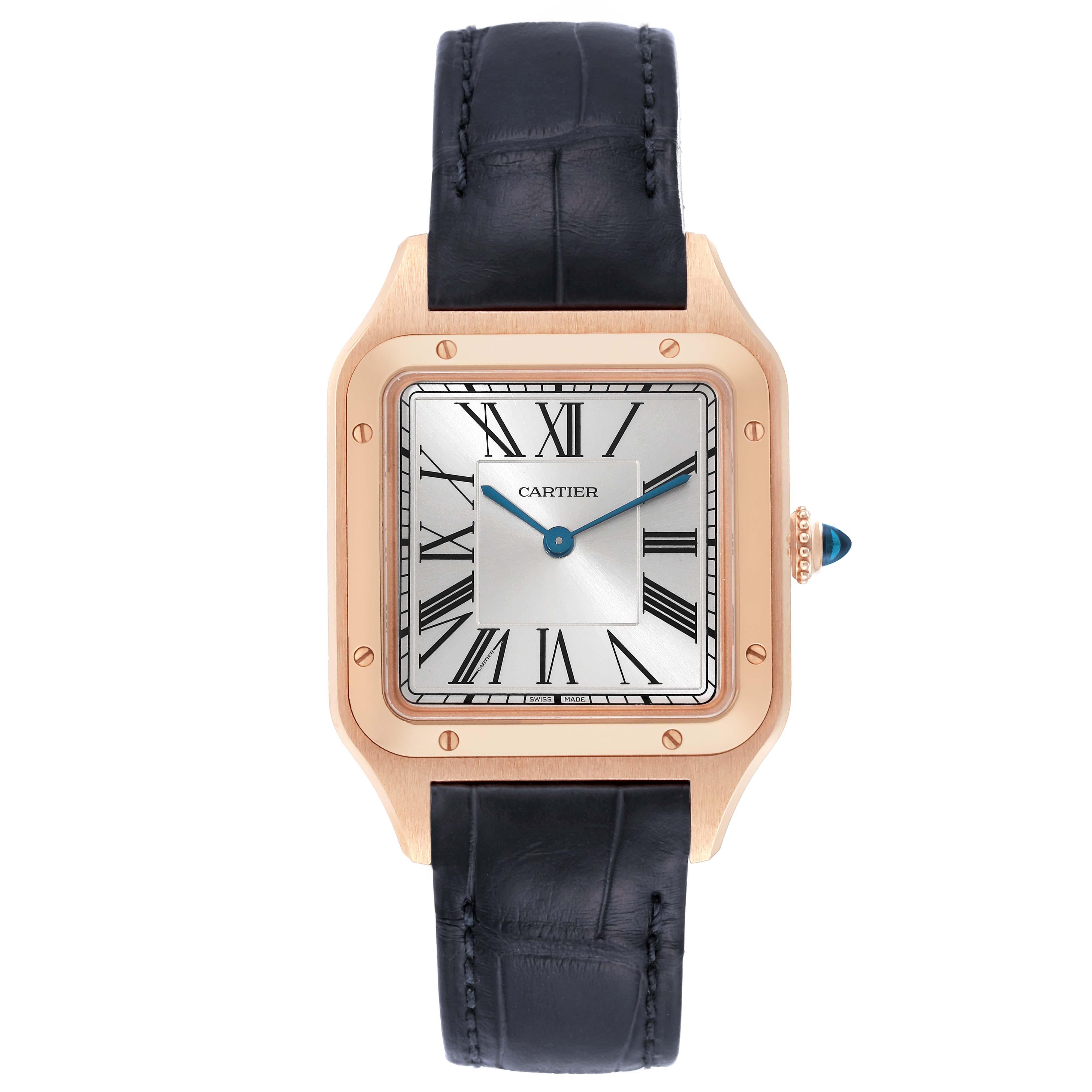 Cartier Santos Dumont Large Rose Gold Silver Dial Mens Watch WGSA0021 Box Card. Quartz movement. 18k rose gold case 43.5 mm x 31.4 mm. Case thickness 7.3 mm. Circular grained crown set with blue sapphire cabochon. 18k rose gold bezel punctuated with
