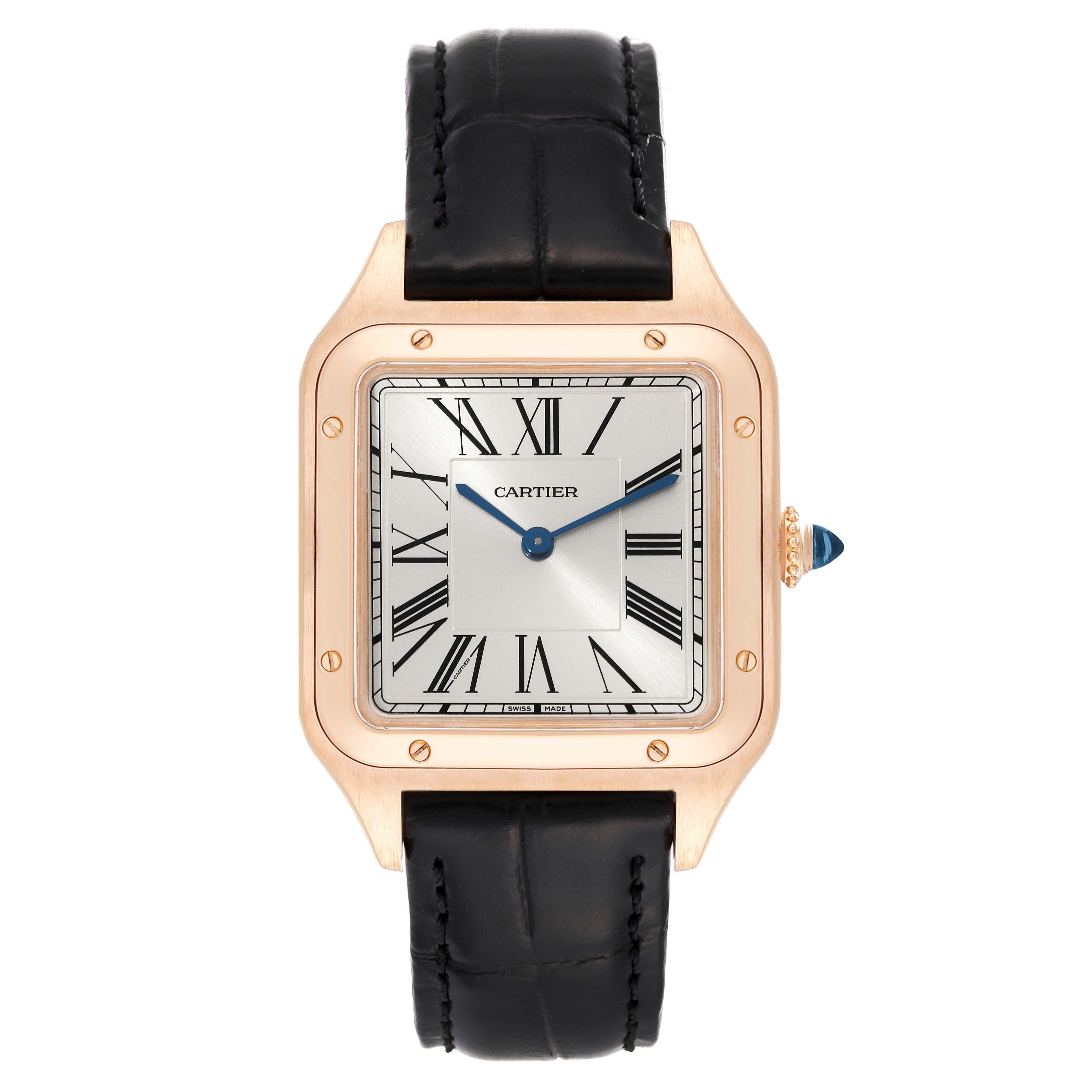 Cartier Santos Dumont Large Rose Gold Silver Dial Mens Watch WGSA0021 Papers. Quartz movement. 18k rose gold case 43.5 mm x 31.4 mm. Case thickness 7.3 mm. Circular grained crown set with blue sapphire cabochon. 18k rose gold bezel punctuated with 8