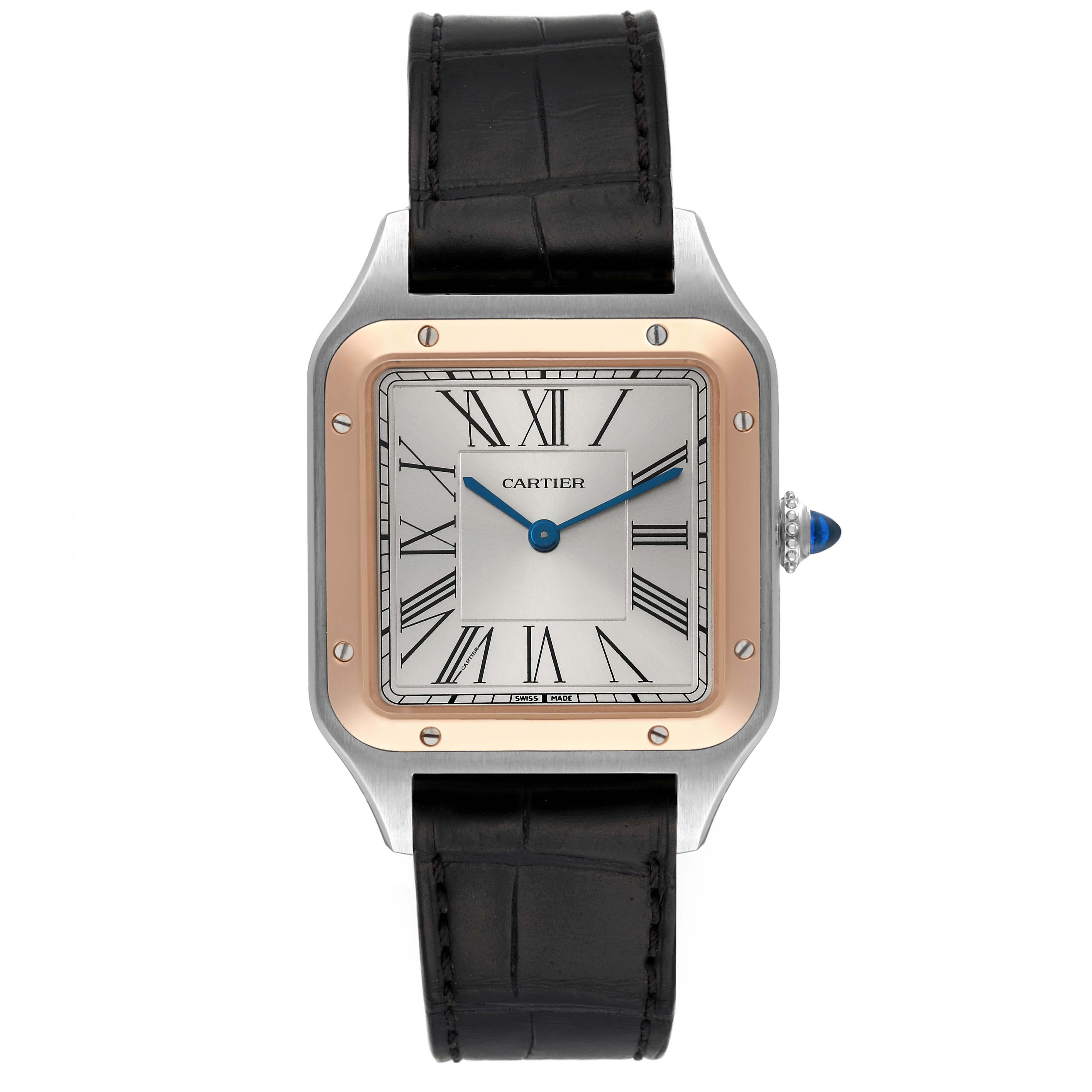 Cartier Santos Dumont Large Steel Rose Gold Mens Watch W2SA0011 Box Card. Quartz movement. Stainless steel case 43.5 mm x 31.4 mm. Case thickness 7.3 mm. Circular grained crown set with blue spinel cabochon. 18k rose gold bezel punctuated with 8