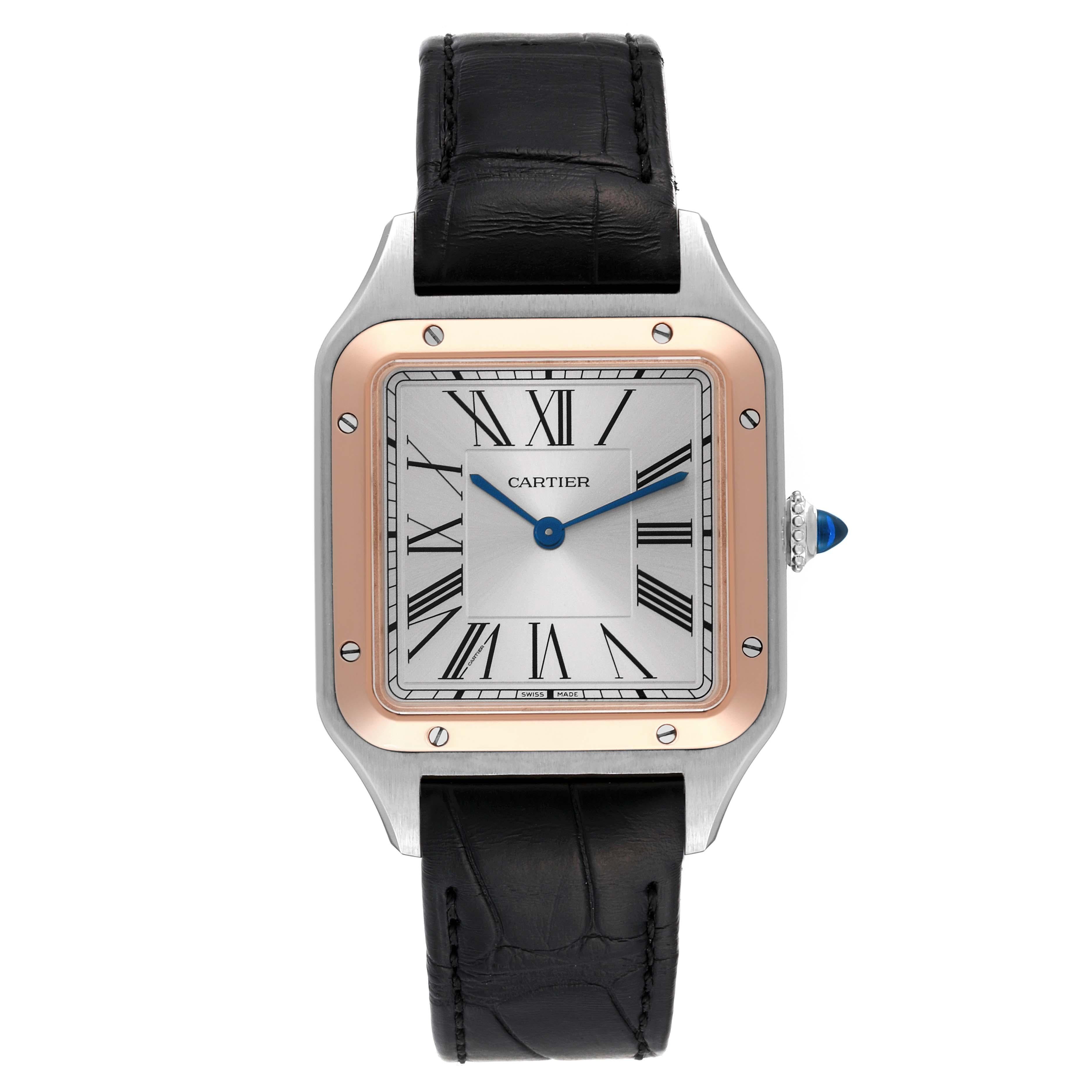 Cartier Santos Dumont Large Steel Rose Gold Mens Watch W2SA0011. Quartz movement. Stainless steel case 43.5 mm x 31.4 mm. Case thickness 7.3 mm. Circular grained crown set with blue spinel cabochon. . Scratch resistant sapphire crystal.