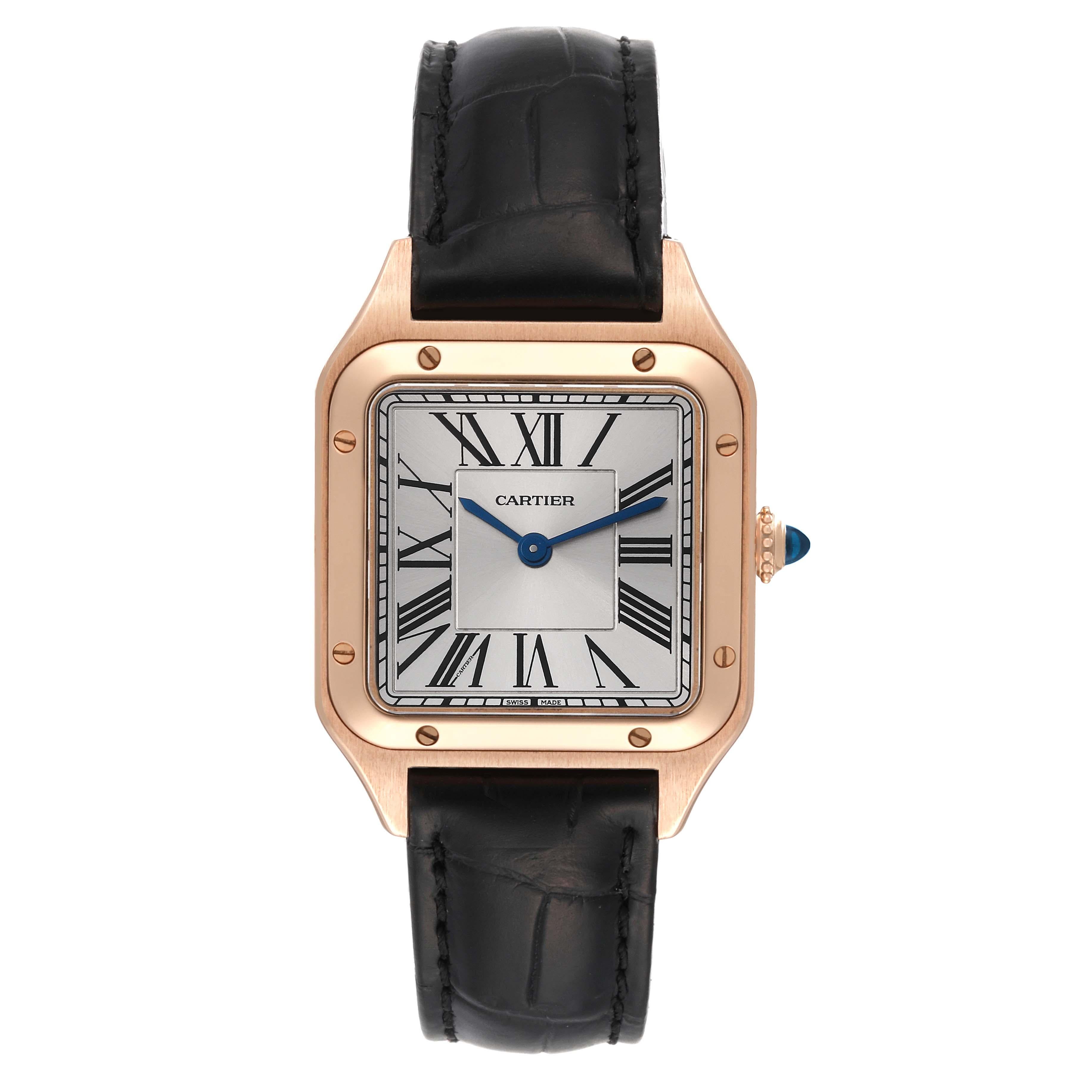Cartier Santos Dumont Small Rose Gold Mens Watch WGSA0022 Card. Quartz movement. 18k rose gold case 38 mm x 27.5 mm. Case thickness 7.3 mm. Circular grained crown set with blue spinel cabochon. . Scratch resistant sapphire crystal. Satin-brushed