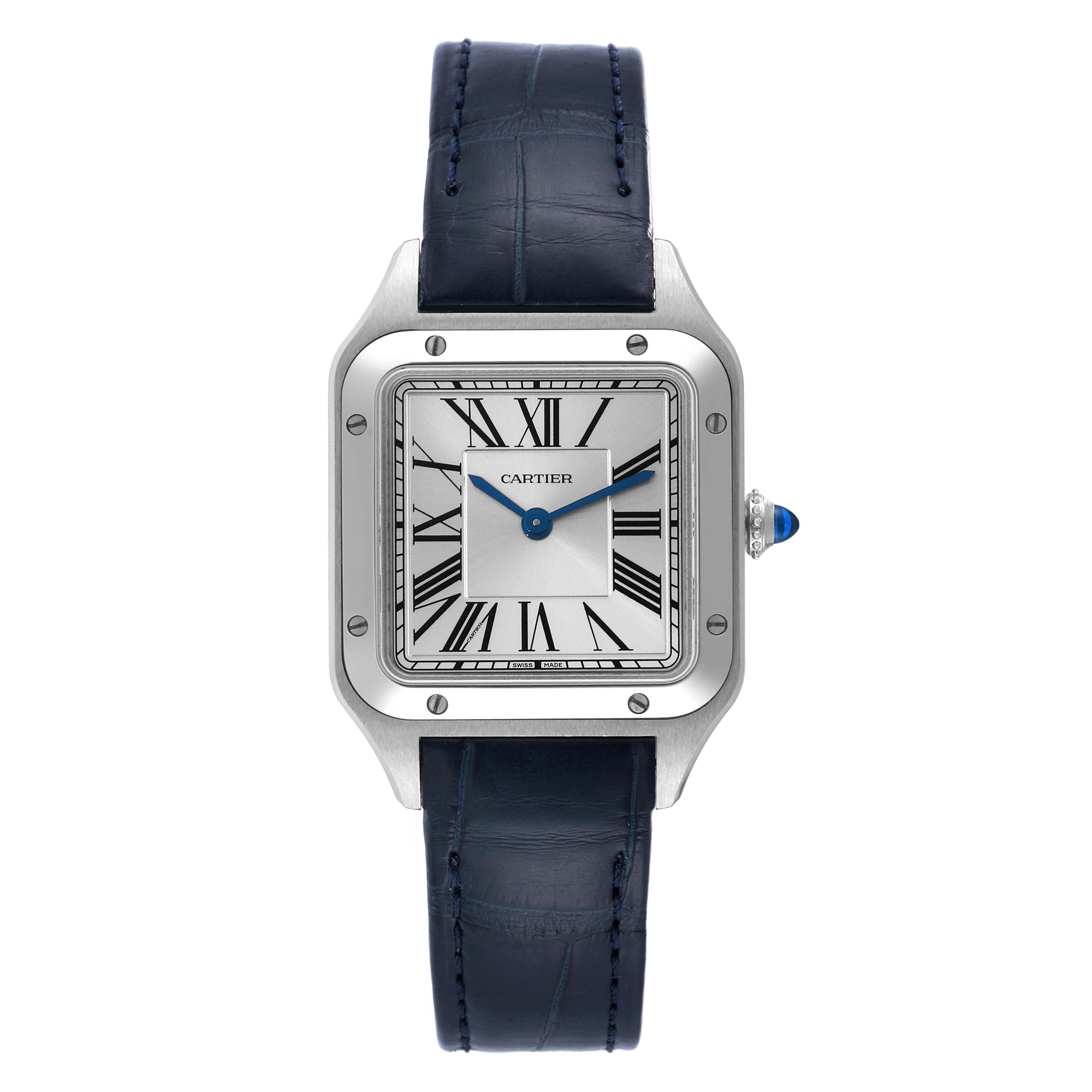 Cartier Santos Dumont Small Steel Ladies Watch WSSA0023 Unworn. Quartz movement. Stainless steel case 38 mm x 27.5 mm. Case thickness 7.3 mm. Circular grained crown set with blue spinel cabochon. Stainless steel bezel punctuated with 8 signature