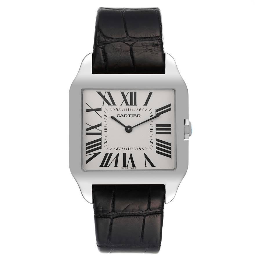 Cartier Santos Dumont White Gold Silver Dial Mens Watch W2007051 Papers. Manual winding movement. 18k white gold case 29 x 35 mm. Circular grained crown set with faceted sapphire. . Scratch resistant sapphire crystal. Silver dial with black Roman