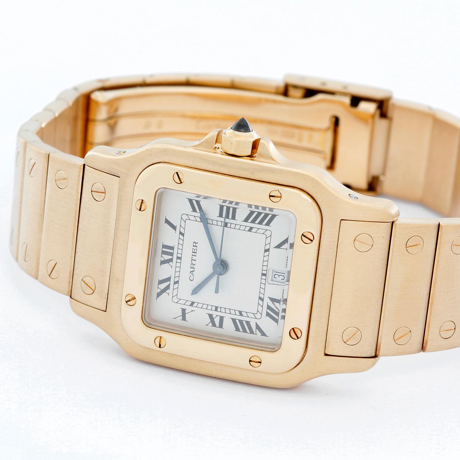 Cartier Santos Galbee 18K Yellow Gold Quartz Watch W20010C5 - Quartz. Yellow Gold case (29mm x 41mm). White dial with black Roman numerals; date at 6 o'clock. 18K Yellow Gold Santos bracelet. Pre-owned Cartier box and papers. Warranty papers dated