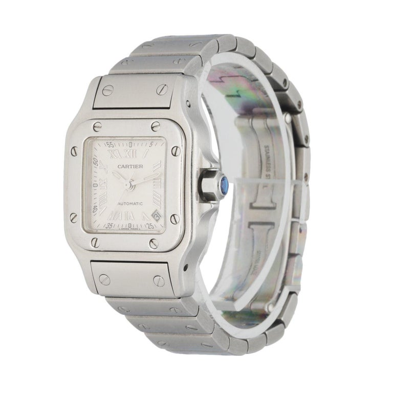 Cartier Santos Galbee 2423 Ladies Watch. 24MM stainless steel case with bezel. Textured Silver dial with silver luminous hands and Roman numeral hour marker; Arabic minute marker on the outer dial. Date display between 4 & 5 o'clock position.