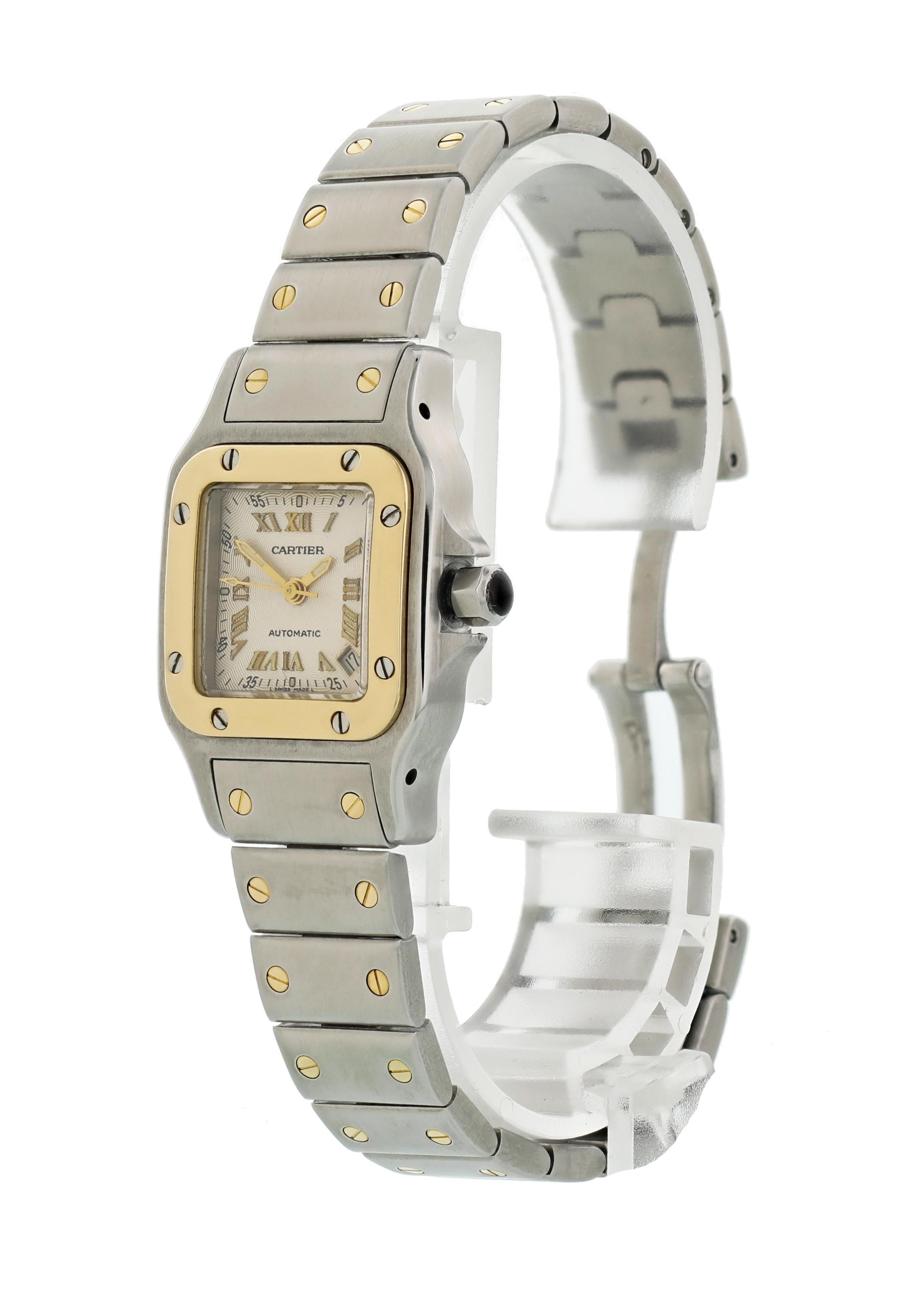 Cartier Santos Galbee 2423 Ladies Watch. 24 mm stainless steel case. 18K yellow gold bezel. Textured silver dial with gold luminous hands and gold Roman numeral hour markers. Date aperture at 4:30. Stainless steel and 18K yellow gold band with a