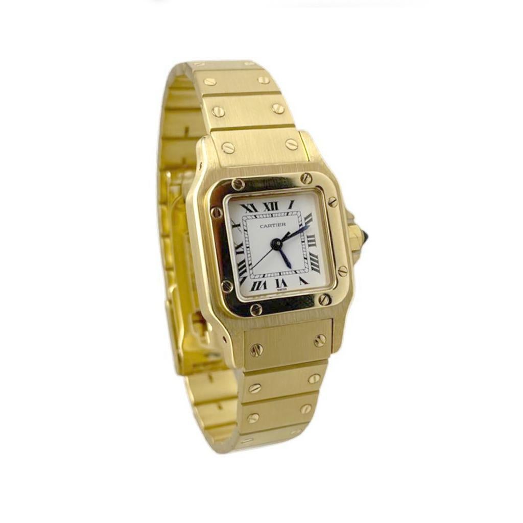 Brand: Cartier

Model: Santos Galbee

Movement: Automatic

Case Size: 34 mm 

Dial: White 

Bezel: 18k Yellow Gold

Case Material: 18k Yellow Gold

Band Material: 18k Yellow Gold

Crystal: Scratch-Resistant Sapphire Glass

Includes: 24 Month
