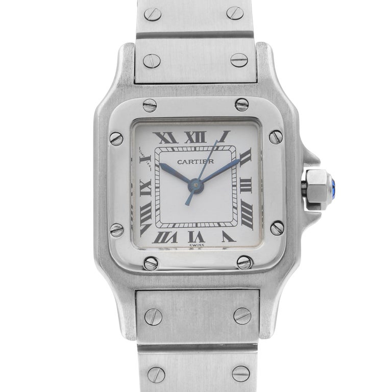 Pre Owned Cartier Santos Galbee 24MM Steel White Dial Automatic Ladies Watch Great Condition. This Timepiece Features: Stainless Steel Case And Bracelet Fixed Stainless Steel Bezel with 8 Screws. White Dial With Blue Steel Sword Shape Hands and