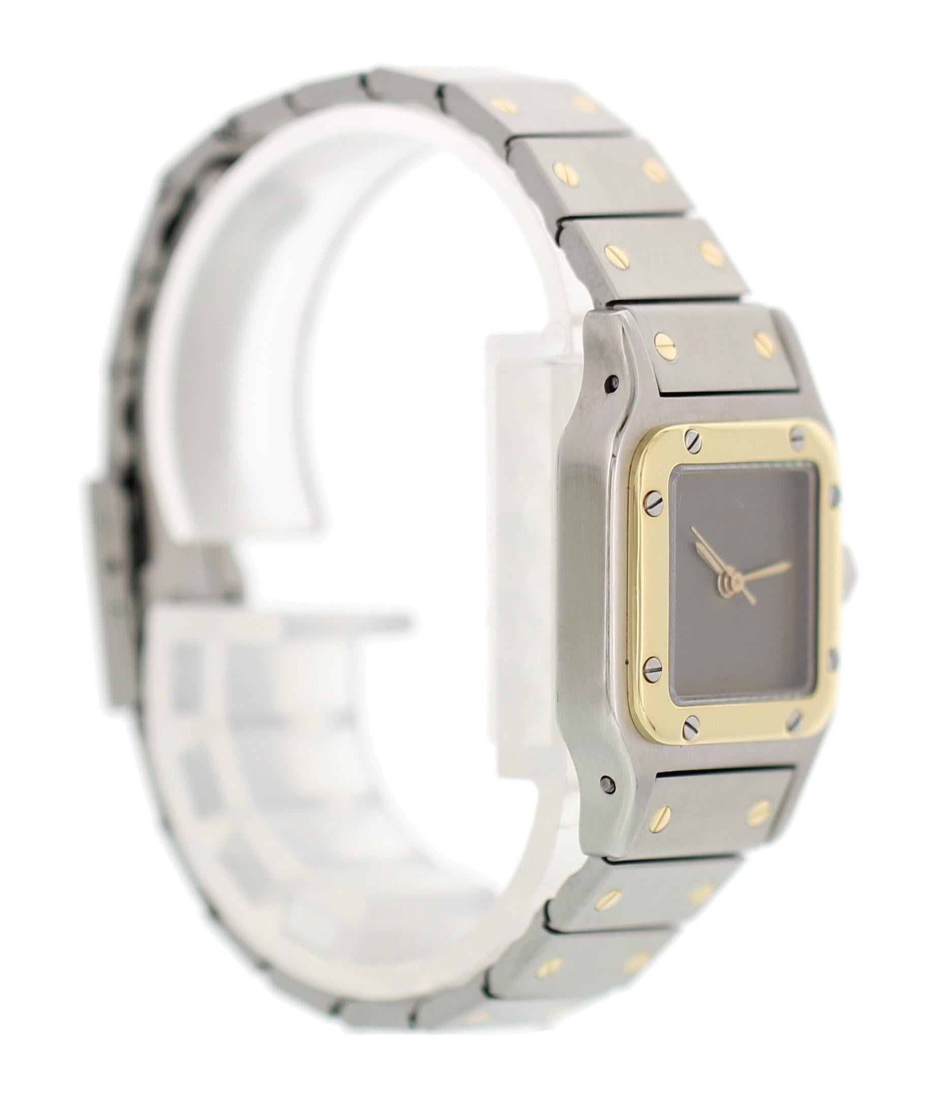 Cartier Santos Galbee. Stainless steel 24 mm case. 18K yellow gold bezel. Gray dial with gold hands. 18K yellow gold and stainless steel band with a steel hidden butterfly clasp. Will fit up to a 5.5 inch wrist. Water resistant. Automatic movement.