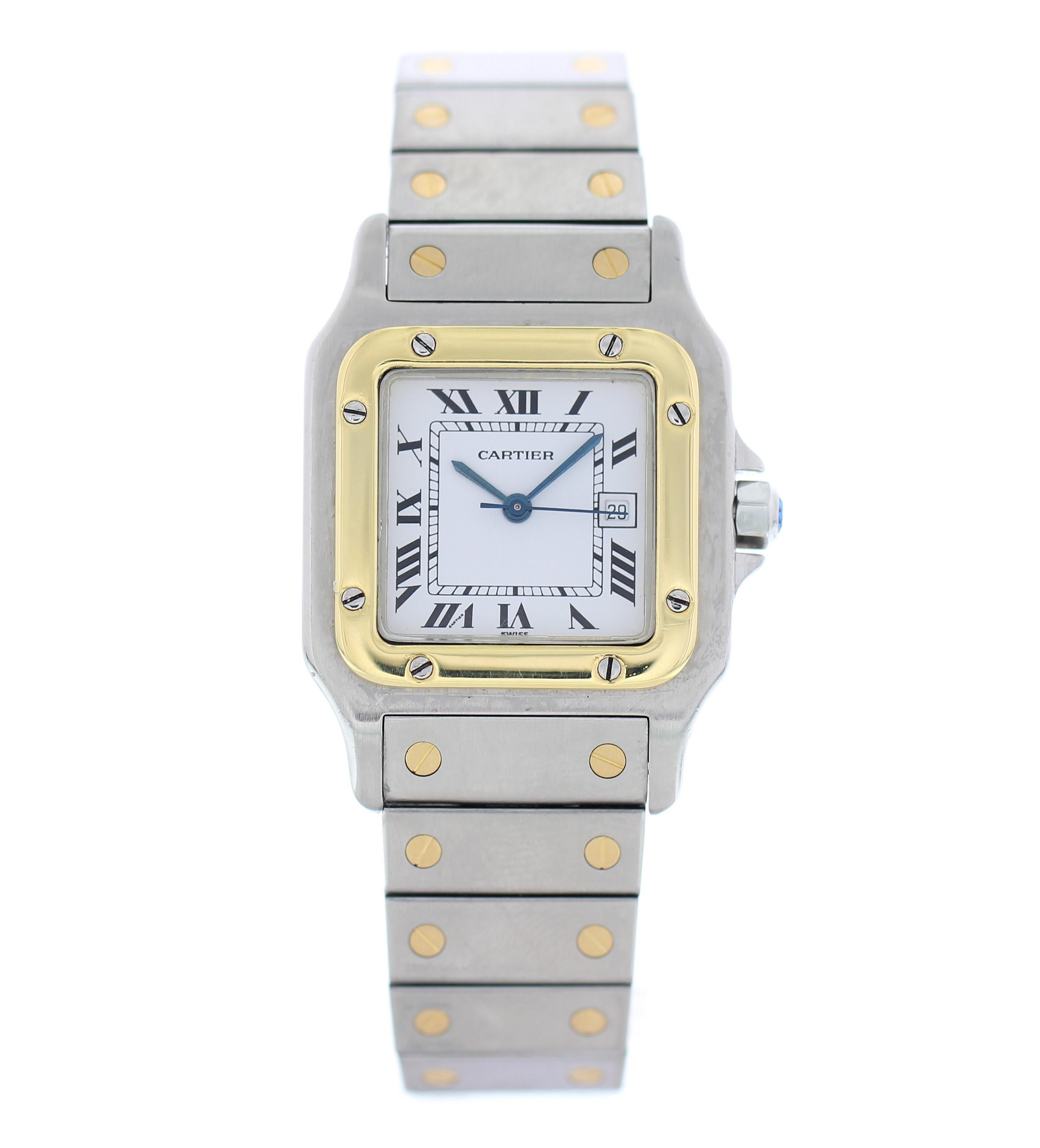 Cartier Santos Galbee 1566 Automatic Watch. 
29mm Stainless Steel case. 
Yellow Gold None bezel. 
White dial with Blue steel hands and roman numeral hour markers. 
Minute markers on the outer dial. 
Date display at the 3 o'clock position. 
Stainless