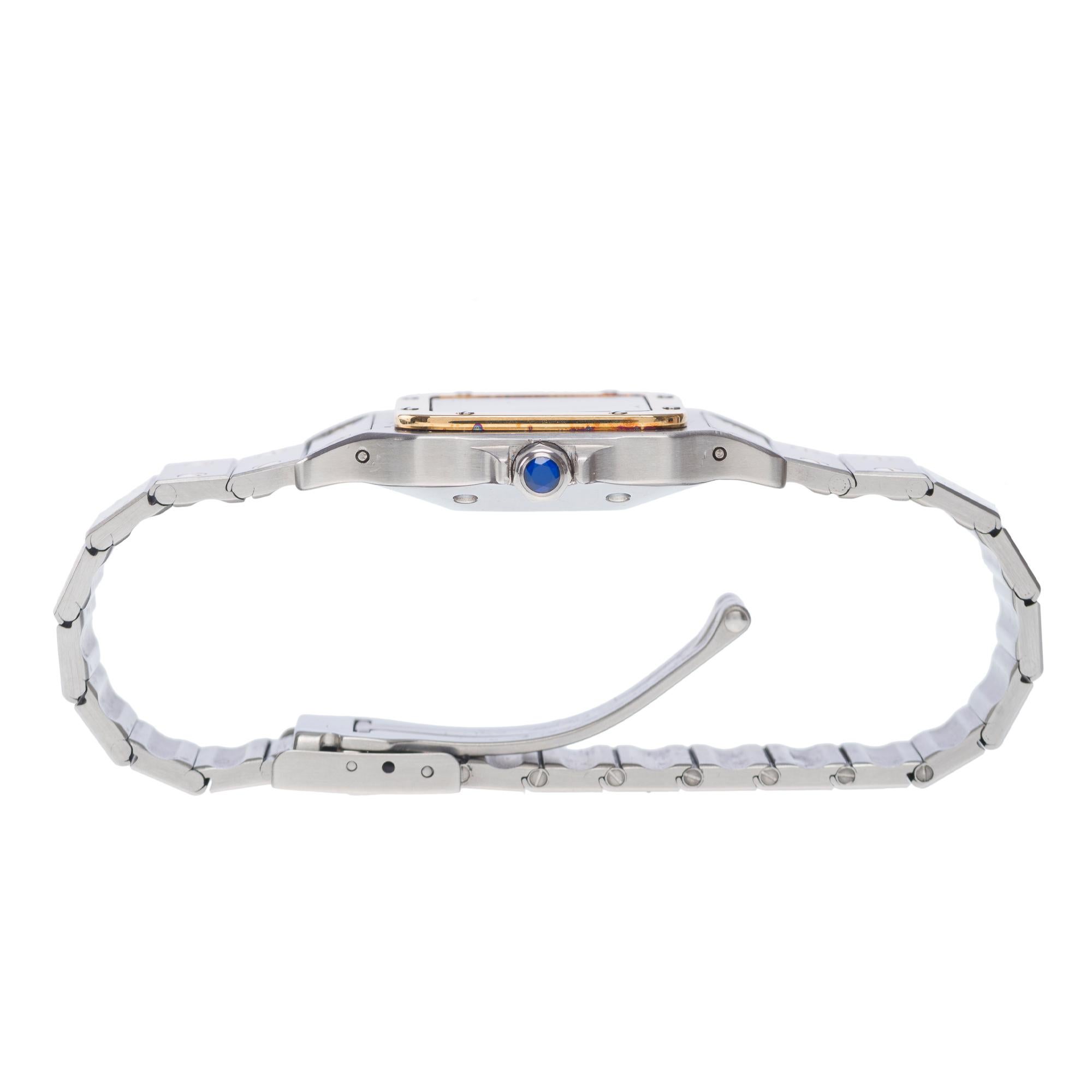 Moderne Montre-bracelet bicolore pour dame Cartier Santos Galbée en or jaune et acier en vente