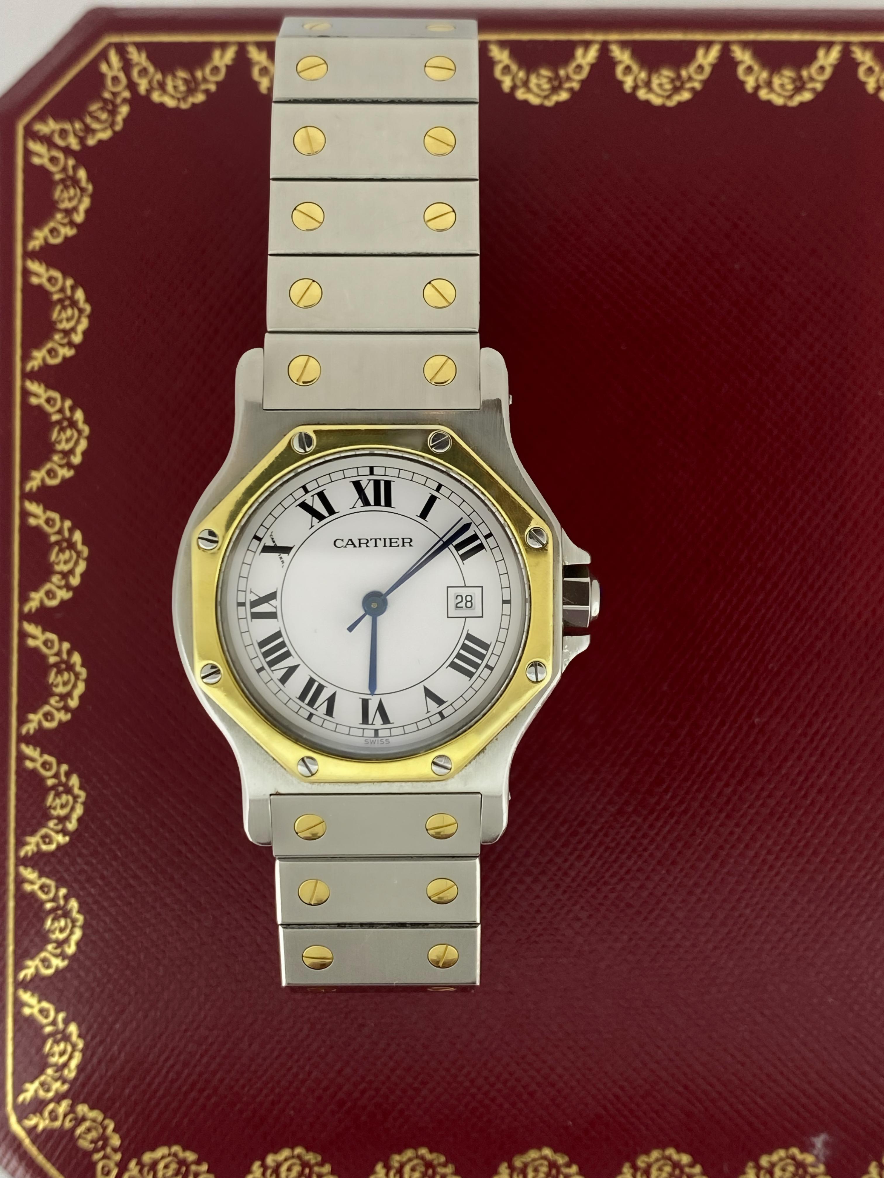 This versatile & rare as hen's teeth  
Cartier Santos Galbée Octagon
is performed in 18K Yellow Gold & Stainless Steel 

Featuring a distinctive & quite desirable 
octagon-shaped 31mm S/Steel Case of
slimmer (than other models) profile of 9mm,