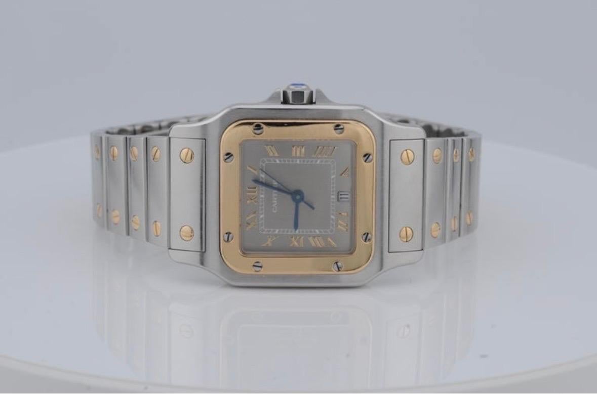 Mouvement esthétique Cartier Santos Galbée Ref. 1566 - Montre à quartz en acier et or en vente
