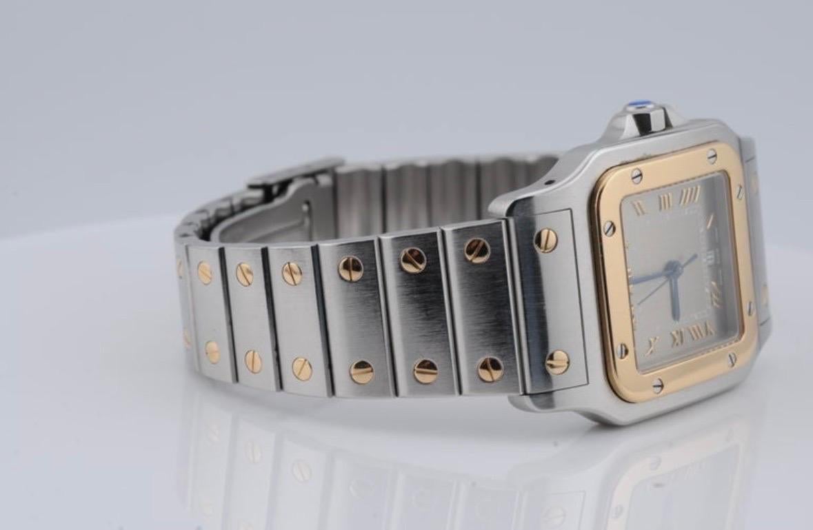 Cartier Santos Galbée Ref. 1566 - Montre à quartz en acier et or en vente 1