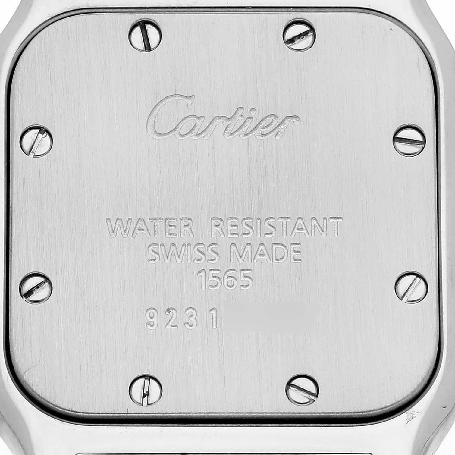 Cartier Santos Galbee Small Silver Dial Steel Ladies Watch W20056D6. Quartz movement. Stainless steel case 24.0 x 34.0 mm. Steel octagonal crown set with a faceted blue spinel cabochon. Stainless steel bezel punctuated with 8 signature screws.