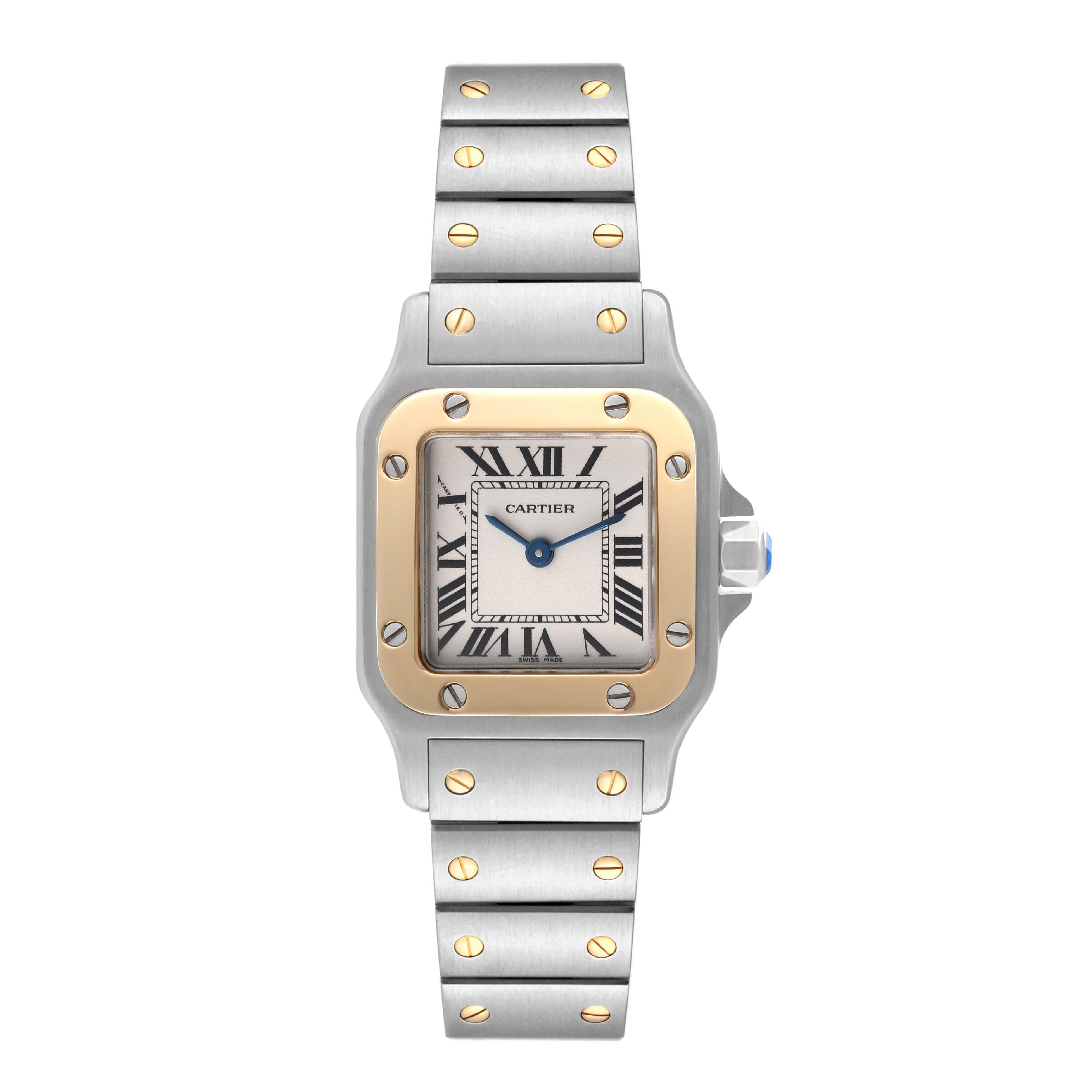 Cartier Santos Galbee Small Steel Yellow Gold Ladies Watch W20012C4 Box Papers. Quartz movement. Stainless steel case 24.0 x 34.7 mm. Steel octagonal crown set with a faceted blue spinel. 18K yellow gold bezel punctuated with 8 signature screws.