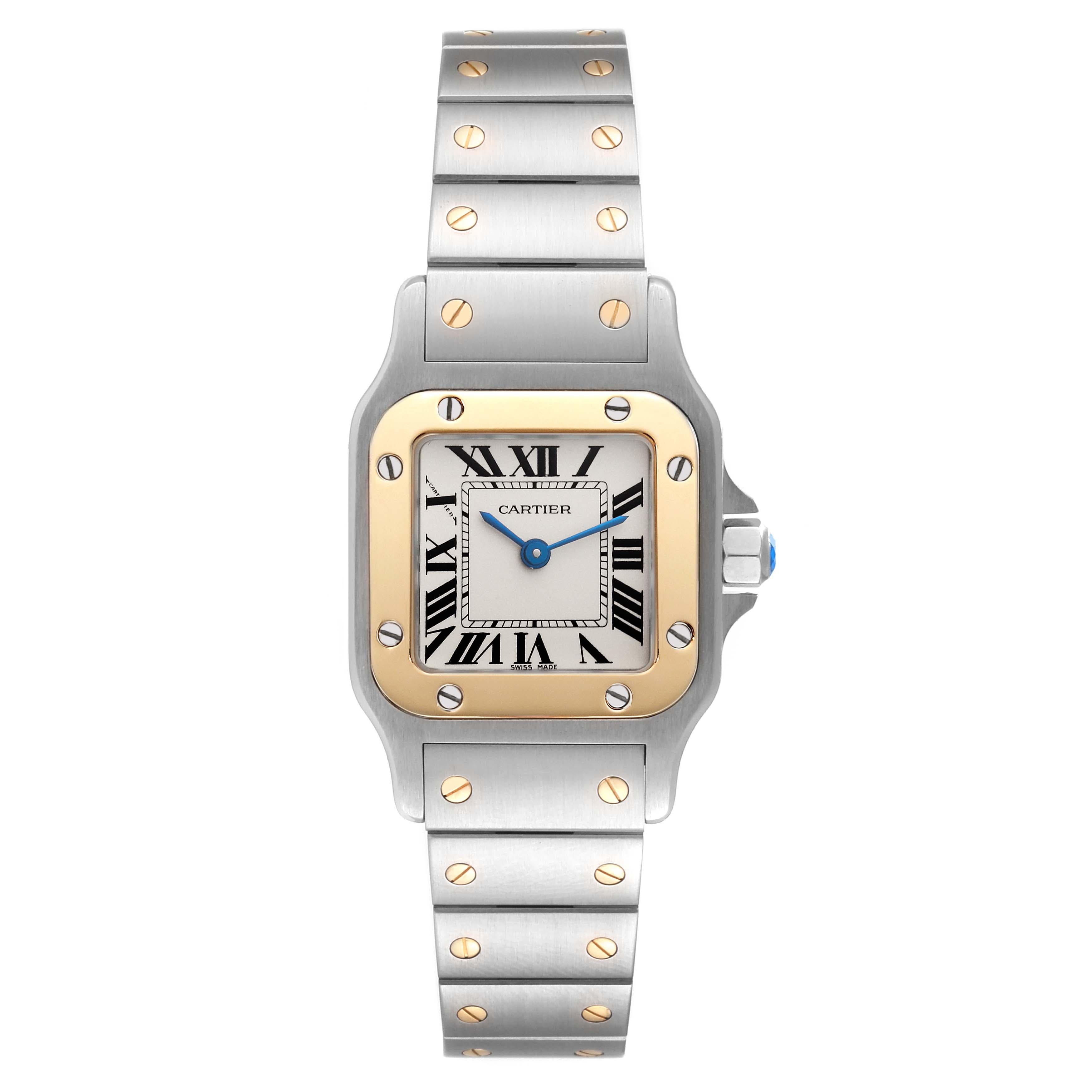 Cartier Santos Galbee Small Steel Yellow Gold Ladies Watch W20012C4. Quartz movement. Stainless steel case 24.0 x 34.7 mm. Steel octagonal crown set with a faceted blue spinel. 18K yellow gold bezel punctuated with 8 signature screws. Scratch