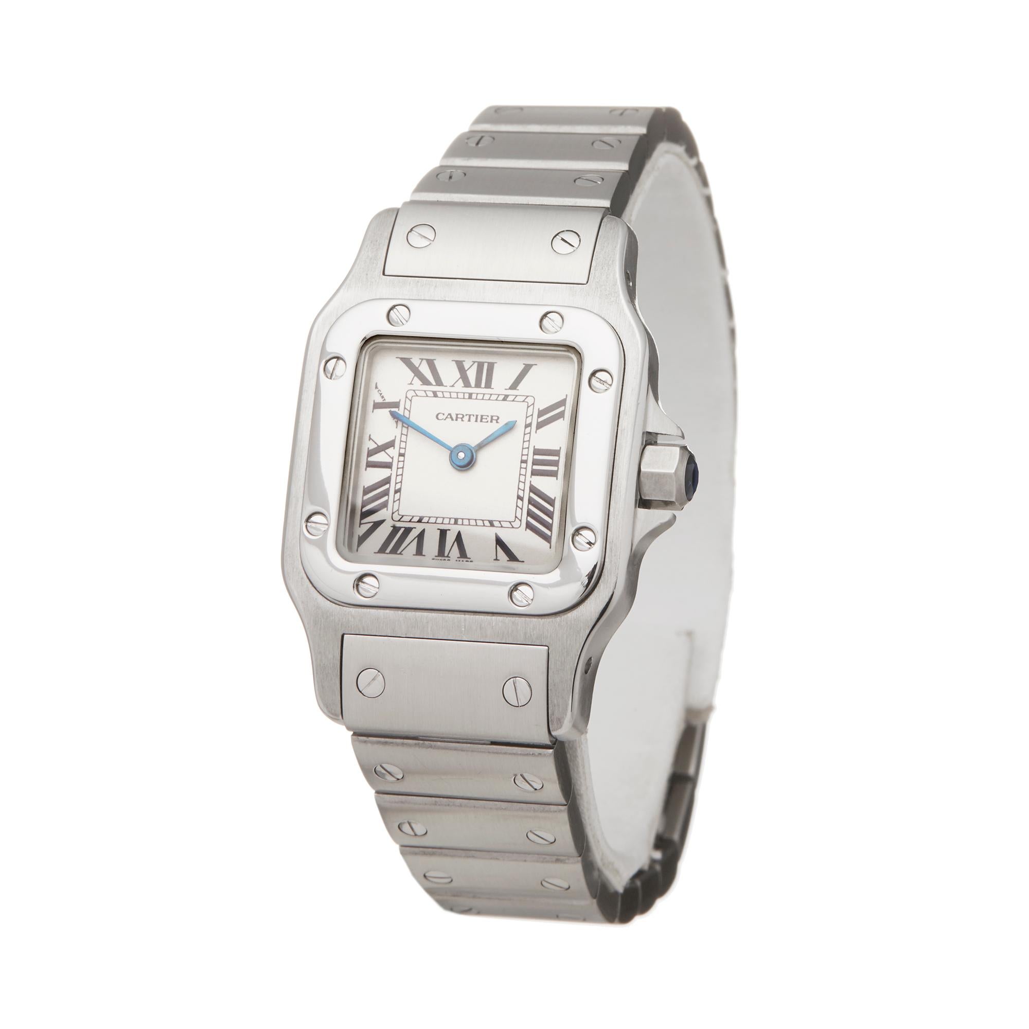 Ref: W5856
Manufacturer: Cartier
Model: Santos Galbee
Model Ref: 1565
Age: Circa 2000's
Gender: Ladies
Complete With: Presentation Box
Dial: White Roman 
Glass: Sapphire Crystal
Movement: Quartz
Water Resistance: To Manufacturers