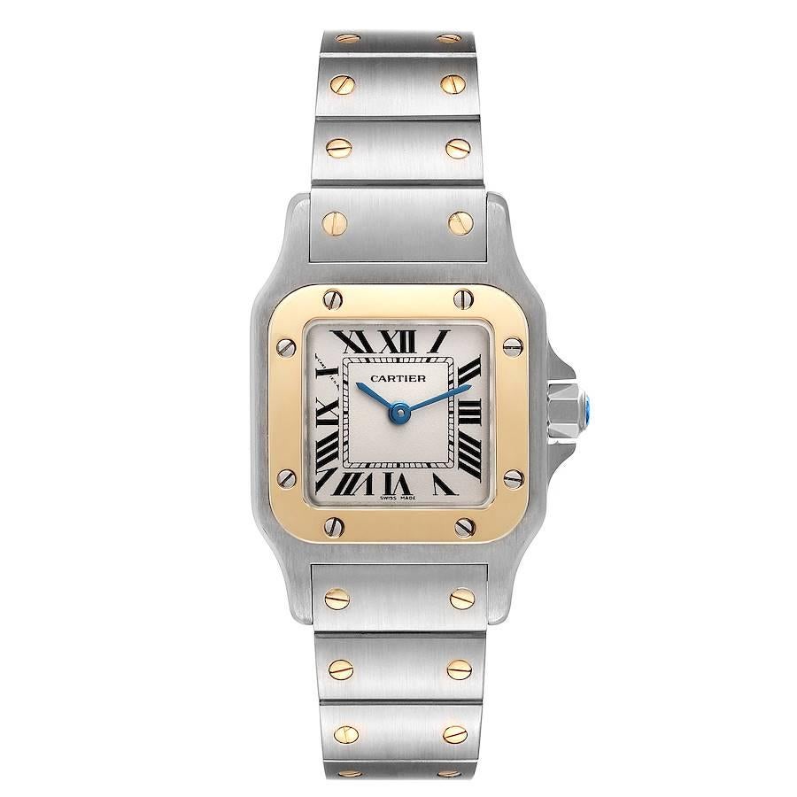 Cartier Santos Galbee Steel Yellow Gold Ladies Watch W20012C4. Quartz movement. Stainless steel case 24.0 x 34.7 mm. Steel octagonal crown set with a faceted blue spinel. 18K yellow gold bezel punctuated with 8 signature screws. Scratch resistant