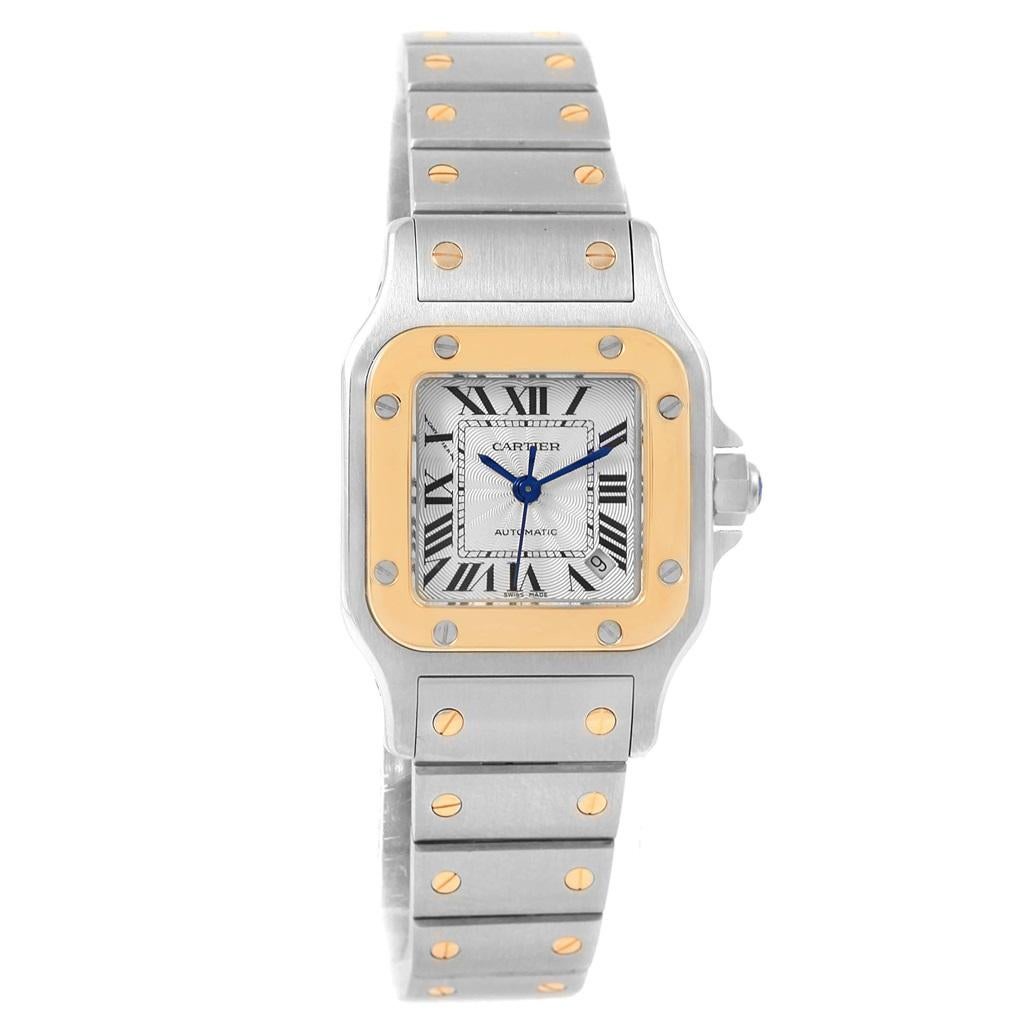 Cartier Santos Galbee Steel Yellow Gold Ladies Watch W20057C4 Box Papers. Automatic self-winding movement. Stainless steel case 24.0 x 24.0 mm. Steel octagonal crown set with the faceted spinel. 18K yellow gold bezel punctuated with 8 signature