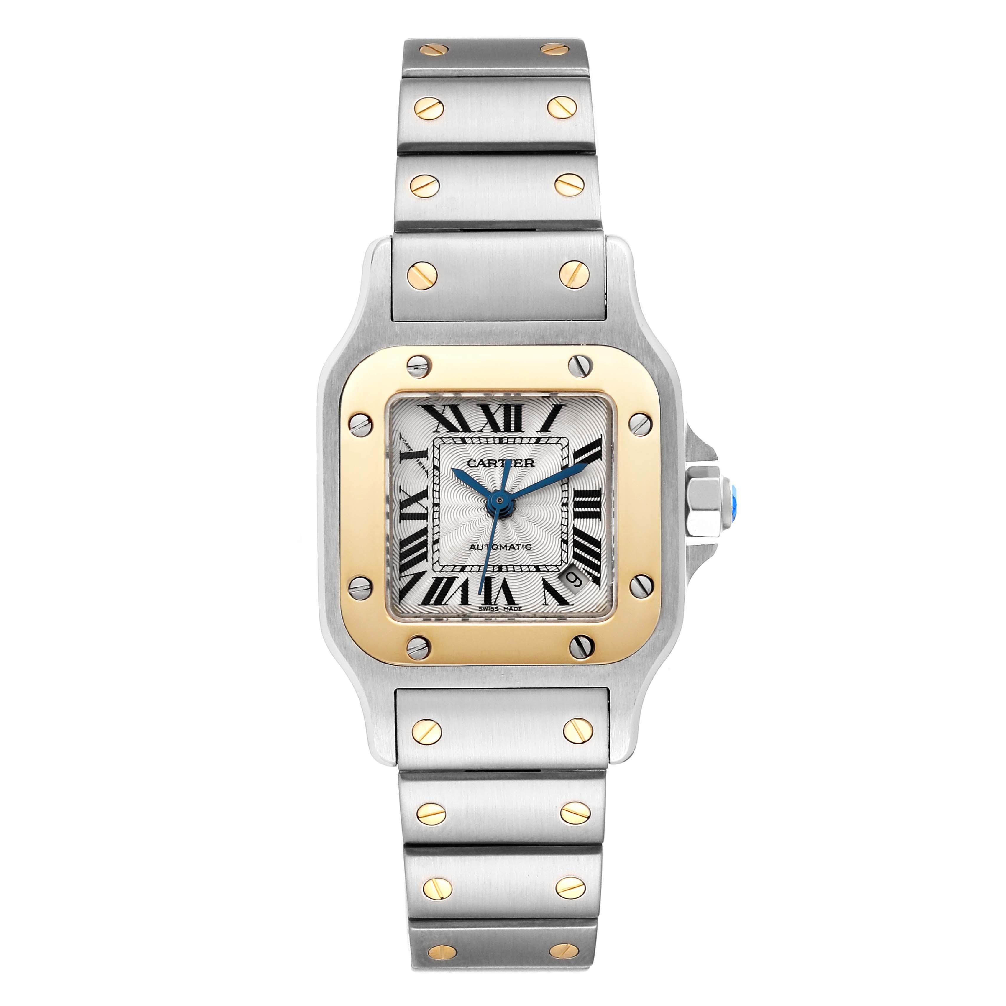 Cartier Santos Galbee Steel Yellow Gold Ladies Watch W20057C4. Automatic self-winding movement. Stainless steel case 24.0 x 24.0 mm. Steel octagonal crown set with blue faceted spinel. 18k yellow gold bezel punctuated with 8 signature screws.