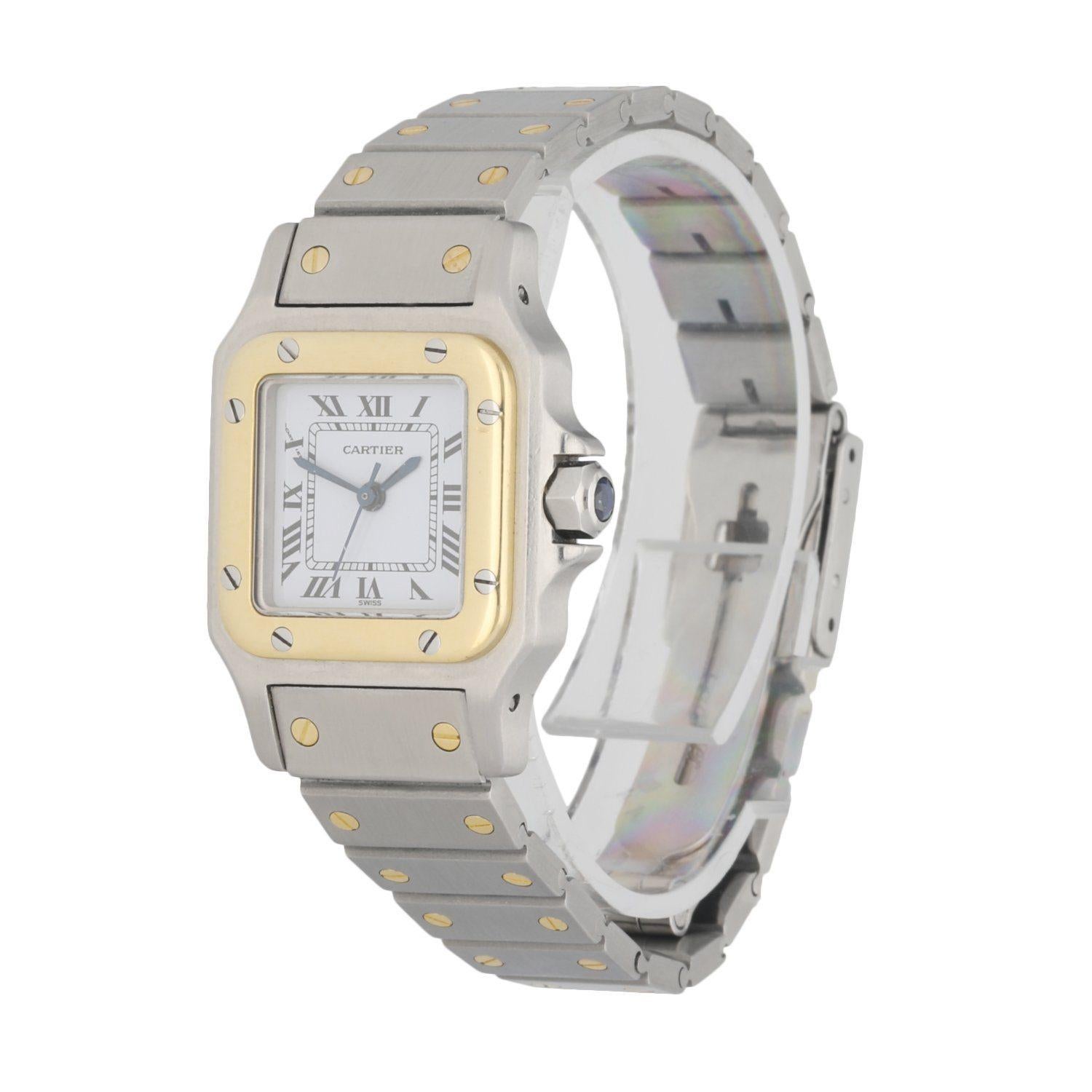 Cartier Santos GalbeeÂ ladies watch. 24mm stainless steel case. 18k yellow gold fixed bezel. White dial with blue hands and black Roman numeral hour marker. 18k yellow gold and stainless steel bracelet with hidden fold over clasp; will fit up to a