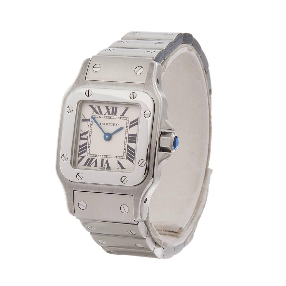 Ref: W4764
Manufacturer: Cartier
Model: Santos Galbee
Model Ref: 1565 or W20056D6
Age: 
Gender: Ladies
Complete With: Box Only
Dial: White Roman 
Glass: Sapphire Crystal
Movement: Quartz
Water Resistance: To Manufacturers Specifications
Case: