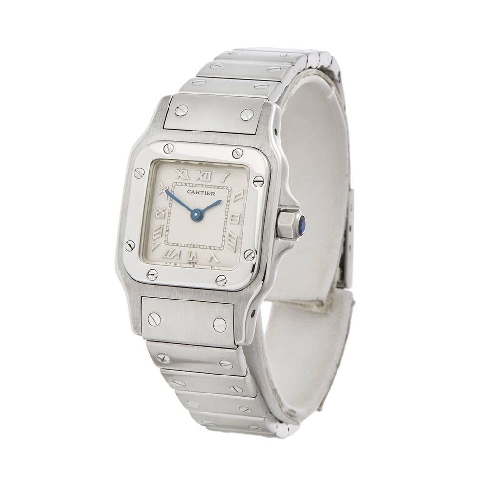 Ref: W4765
Manufacturer: Cartier
Model: Santos Galbee
Model Ref: 1565 or W20056D6
Age: 
Gender: Ladies
Complete With: Xupes Presentation Box
Dial: White Roman 
Glass: Sapphire Crystal
Movement: Quartz
Water Resistance: To Manufacturers