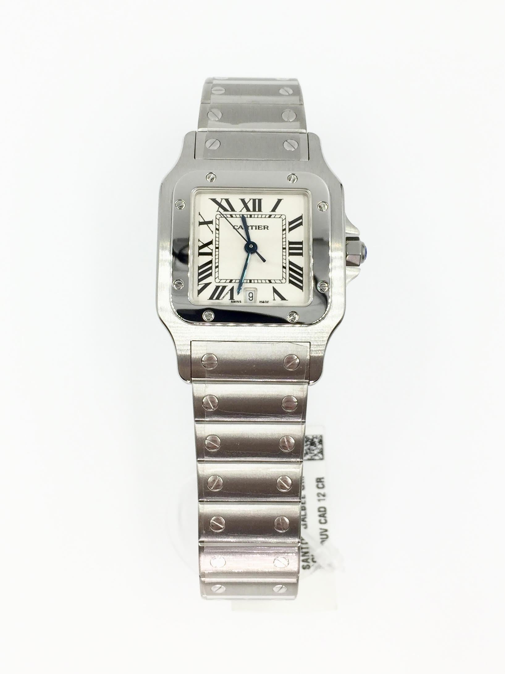 From the iconic Cartier Santos collection, this quartz stainless steel Galbee 29mmx29mm size is a rare find in new condition. Features include: silvery dial with classic Cartier roman numerals, date indicator at 6 o'clock, sapphire crystal with