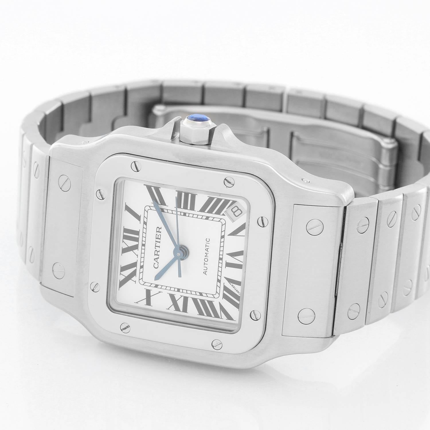 Cartier Santos Galbee XL Men's Stainless Steel Watch -  Automatic movement. Stainless steel  case (32mm). White dial with black Roman numerals, blued steel hands and date between 4 & 5 o'clock. Stainless steel Santos bracelet. Pre-owned with custom