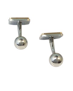 Boutons de manchette Cartier Santos en or et acier Steele