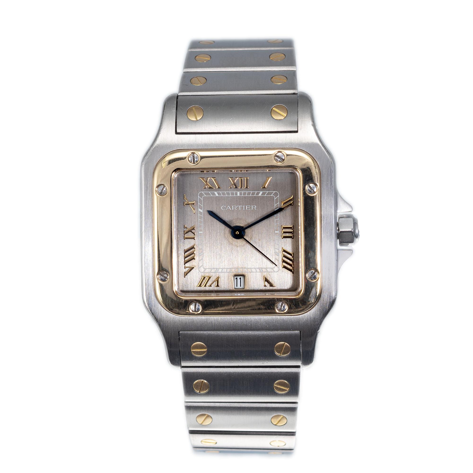 Men's square Cartier Santos model 1566 quartz movement with date. Steel and 18k yellow gold case and band.  

Length: 41.33mm
Width: 29mm
Band width at case: 18mm
Case thickness: 6.80mm
Band: two-tone Stainless Steel and 18k yellow gold   6 7/8 in