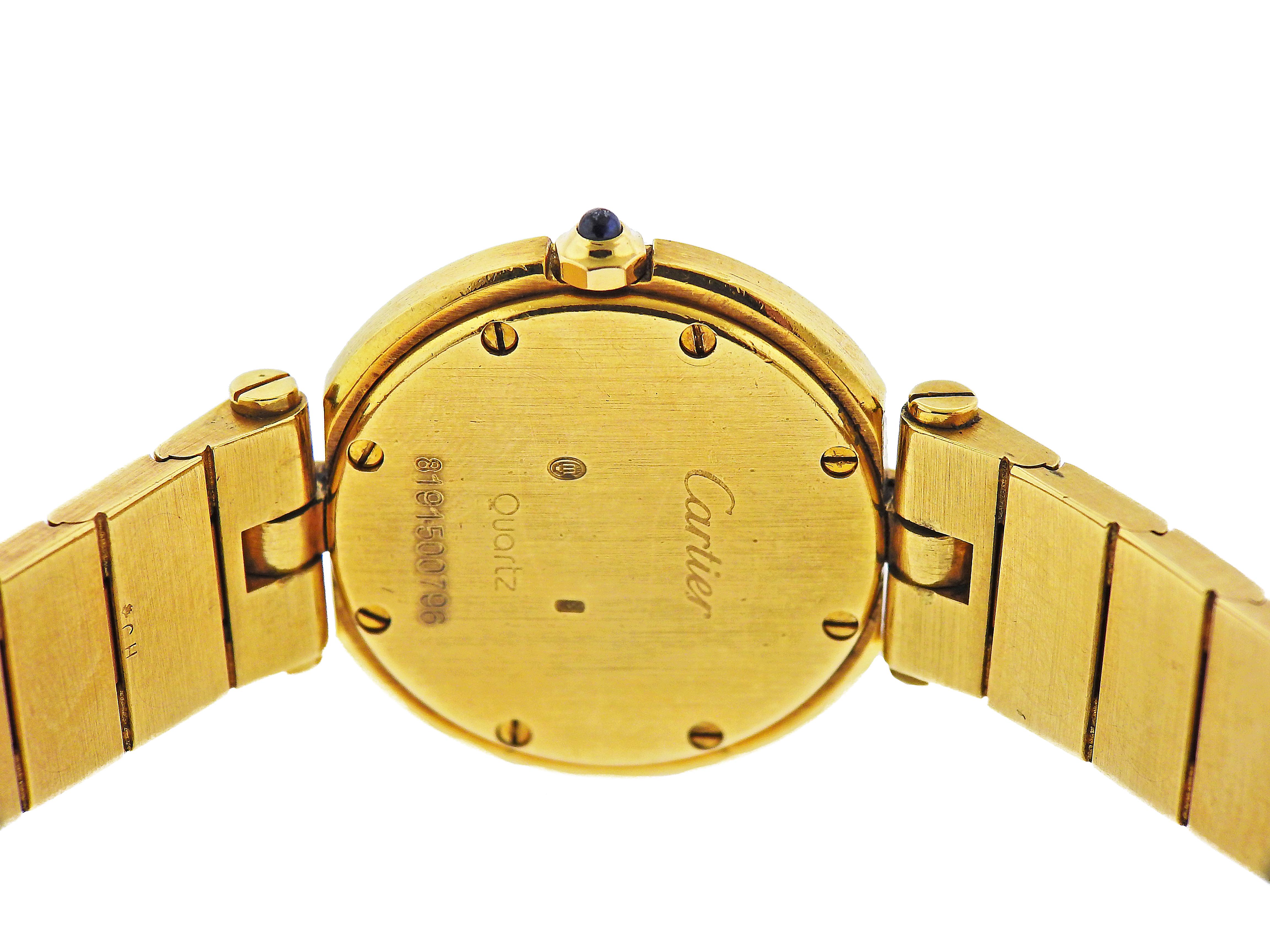 Cartier Santos Armbanduhr aus 18 Karat Gelbgold 1