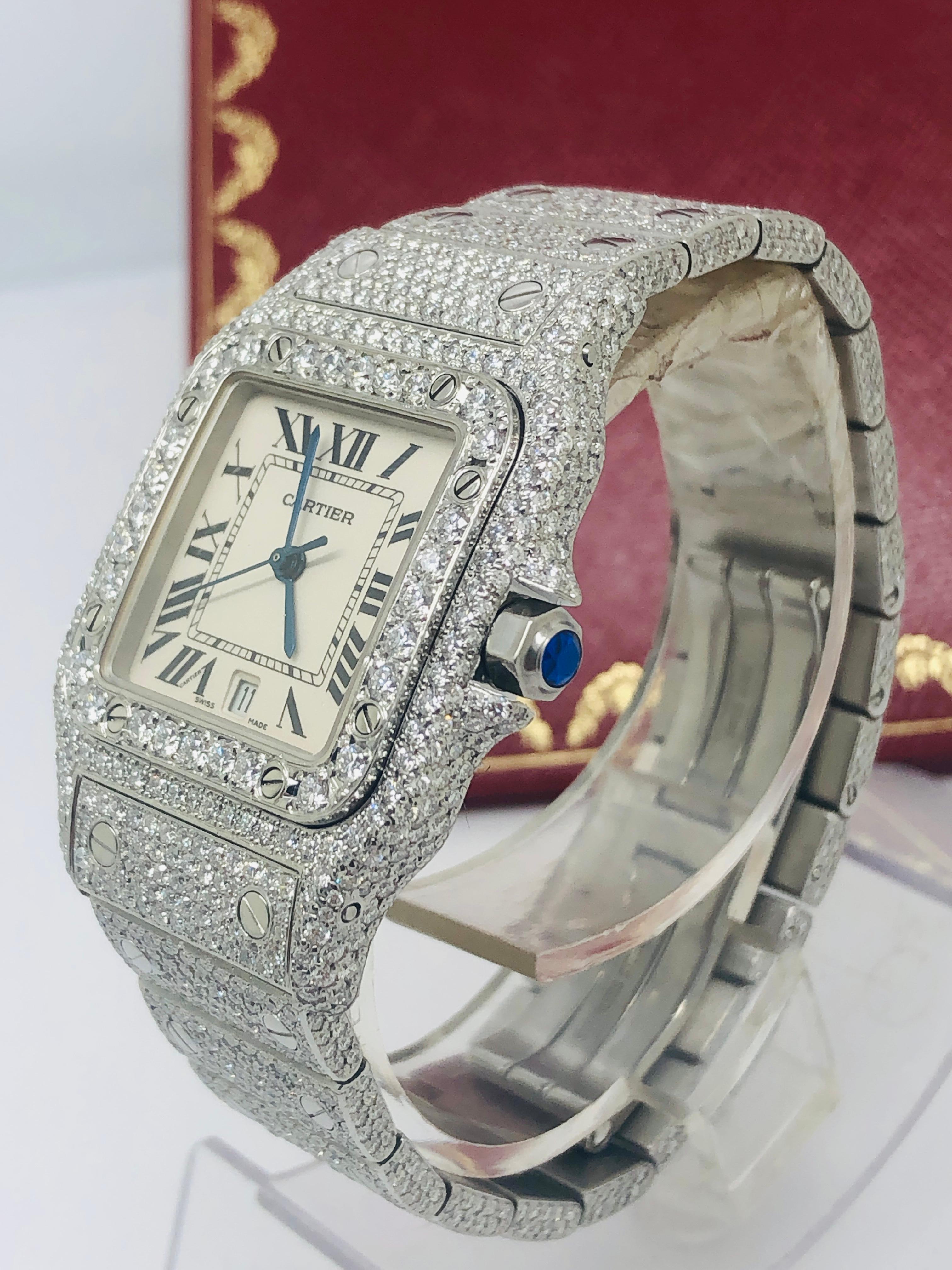 Cartier Santos Midsize unisex watch 29mm
!! WE HAVE EXTRA LINKS AVAILABLE!! 
15 Carats F VVS Diamonds
 White Roman Dial Watch

very high quality diamonds and labor were put in this all original 100% Cartier Watch

buy with confidence were are the