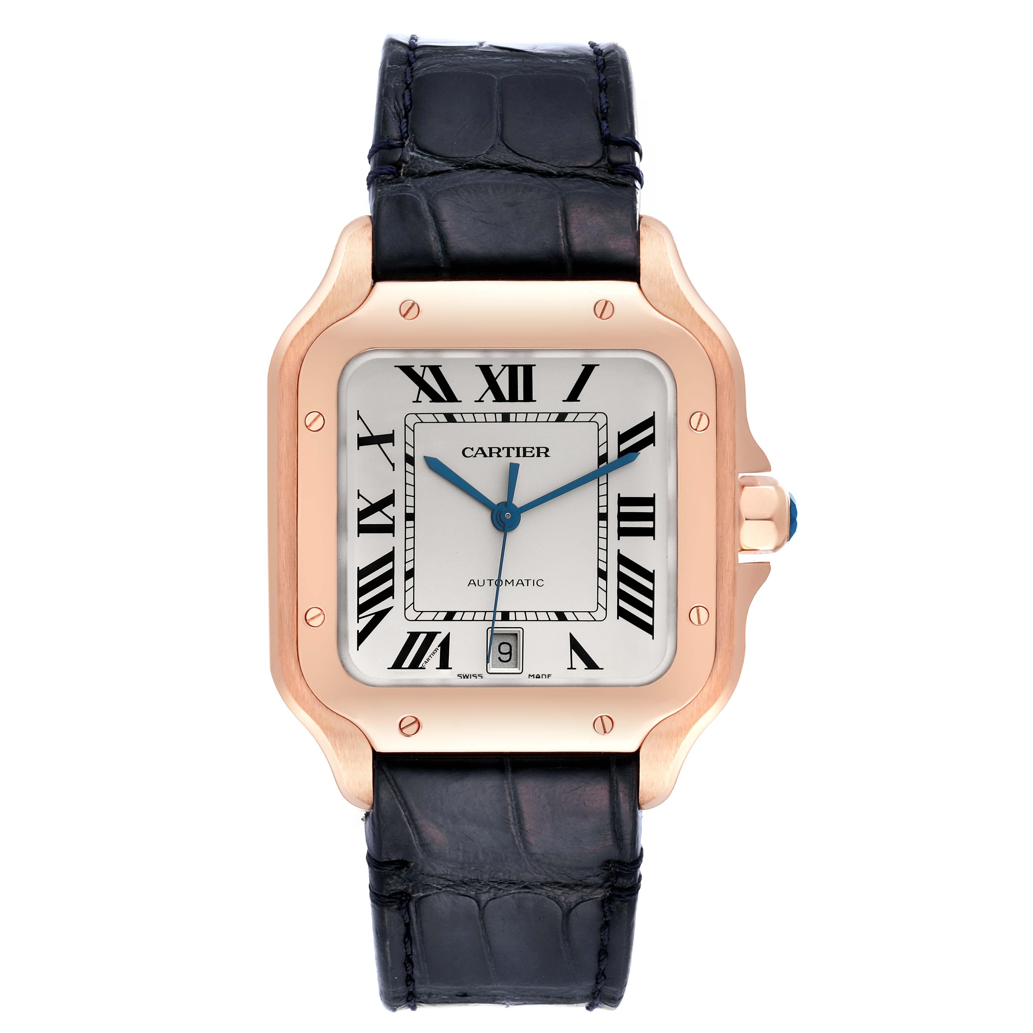 Cartier Santos Large Rose Gold Blue Strap Mens Watch WGSA0019 Box Card. Automatic self-winding movement. 18K rose gold case 47.5 x 38 mm.  Octagonal crown set with a faceted blue sapphire. 18K rose gold bezel punctuated with 8 signature screws.