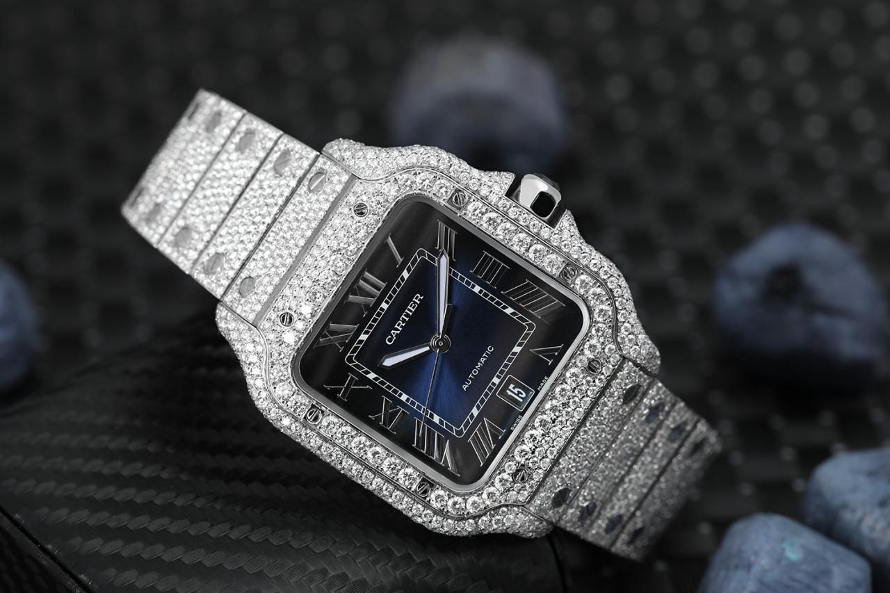 Cartier Santos Large Stainless Steel Watch with Custom Diamonds Blue Roman Numeral Dial WSSA0018

WATCH COMES WITH ORIGINAL BOX, PAPERS AND ADDITIONAL BLUE LEATHER STRAP! Mechanical movement with automatic winding, caliber 1847 MC. Steel case,