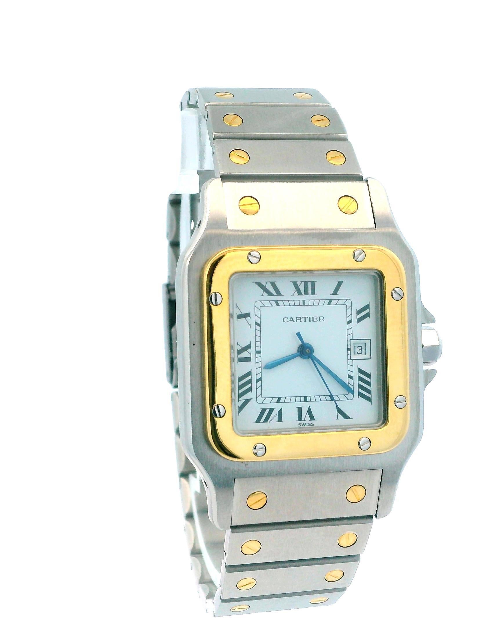 Cartier Santos de Cartier 2961 Watch. This timepiece features a 29mm stainless steel case and an 18K yellow gold fixed bezel. The off-white dial is complemented by blue hands and Roman numeral hour markers. It comes with an 18K yellow gold and