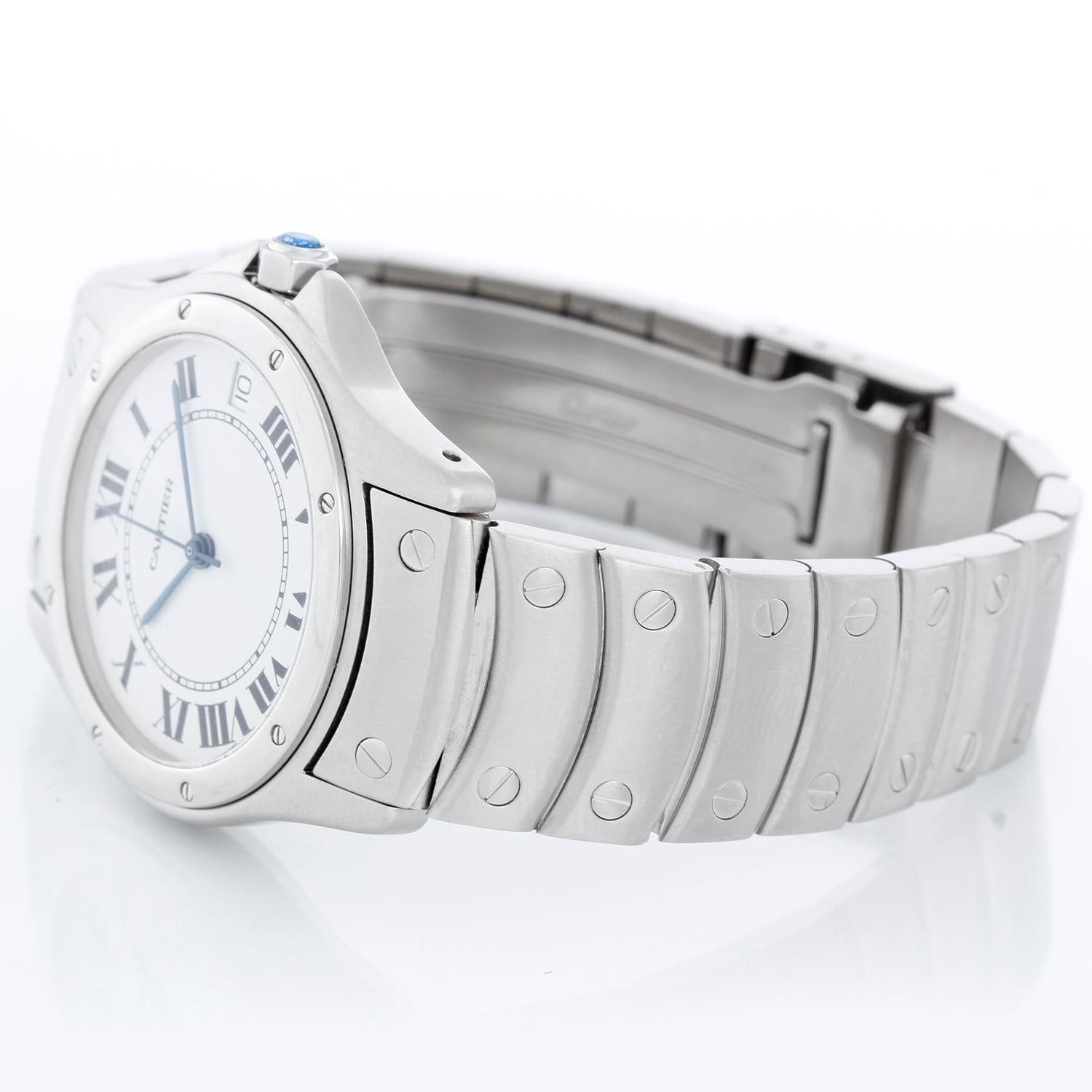 Cartier Santos Men's/Ladies Midsize 33mm Stainless Steel Automatic Watch - Automatic. Stainless steel case (33mm diameter). White dial with black Roman numerals. Stainless steel bracelet; will fit up to a 7 inch wrist. Pre-owned with custom box. 