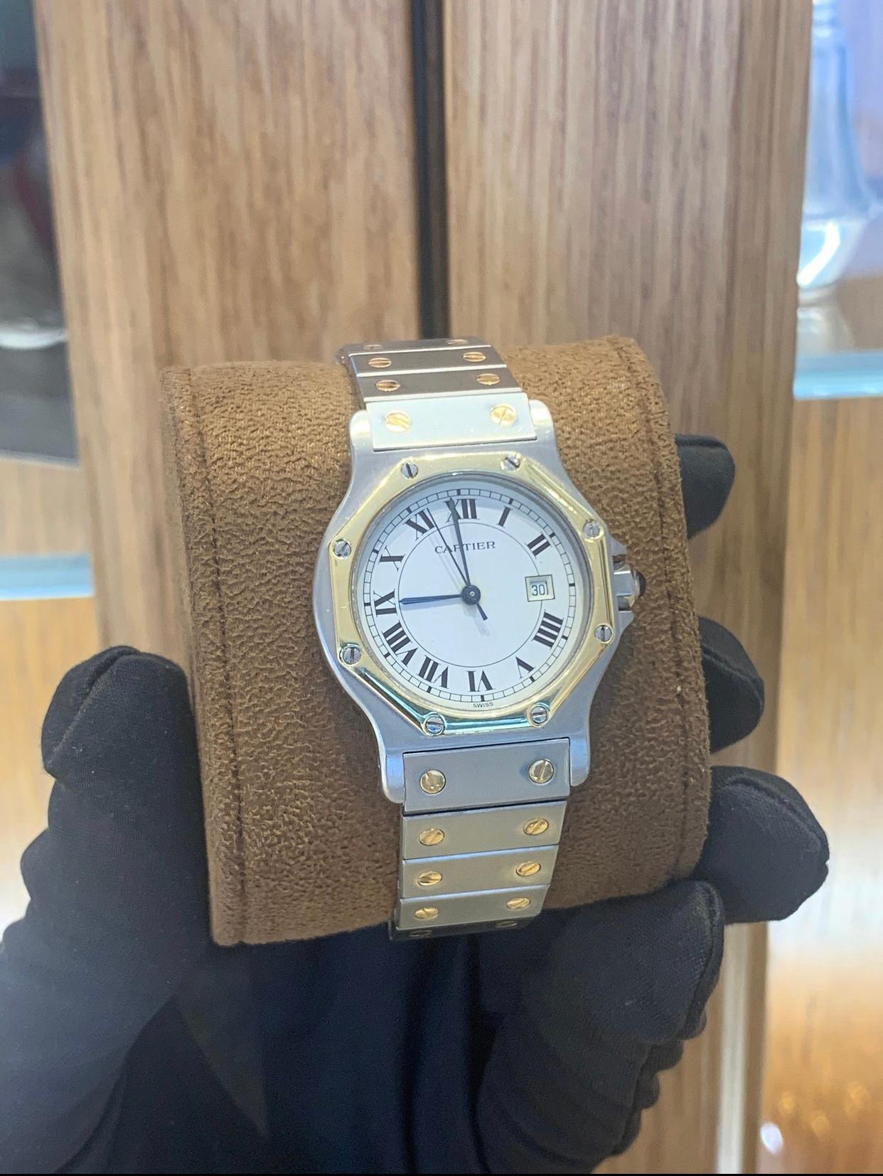 In Mint Condition.
Swiss Made, Cartier Santos In Stainless Steel & 18k Yellow Gold. Solid Gold.
Nice & Strong Bracelet. Solid Links.
Automatic Movement.
Nice Large Size Case, 31mm.
Great Everyday Piece, Comfortable Fit On The Wrist.
Awesome