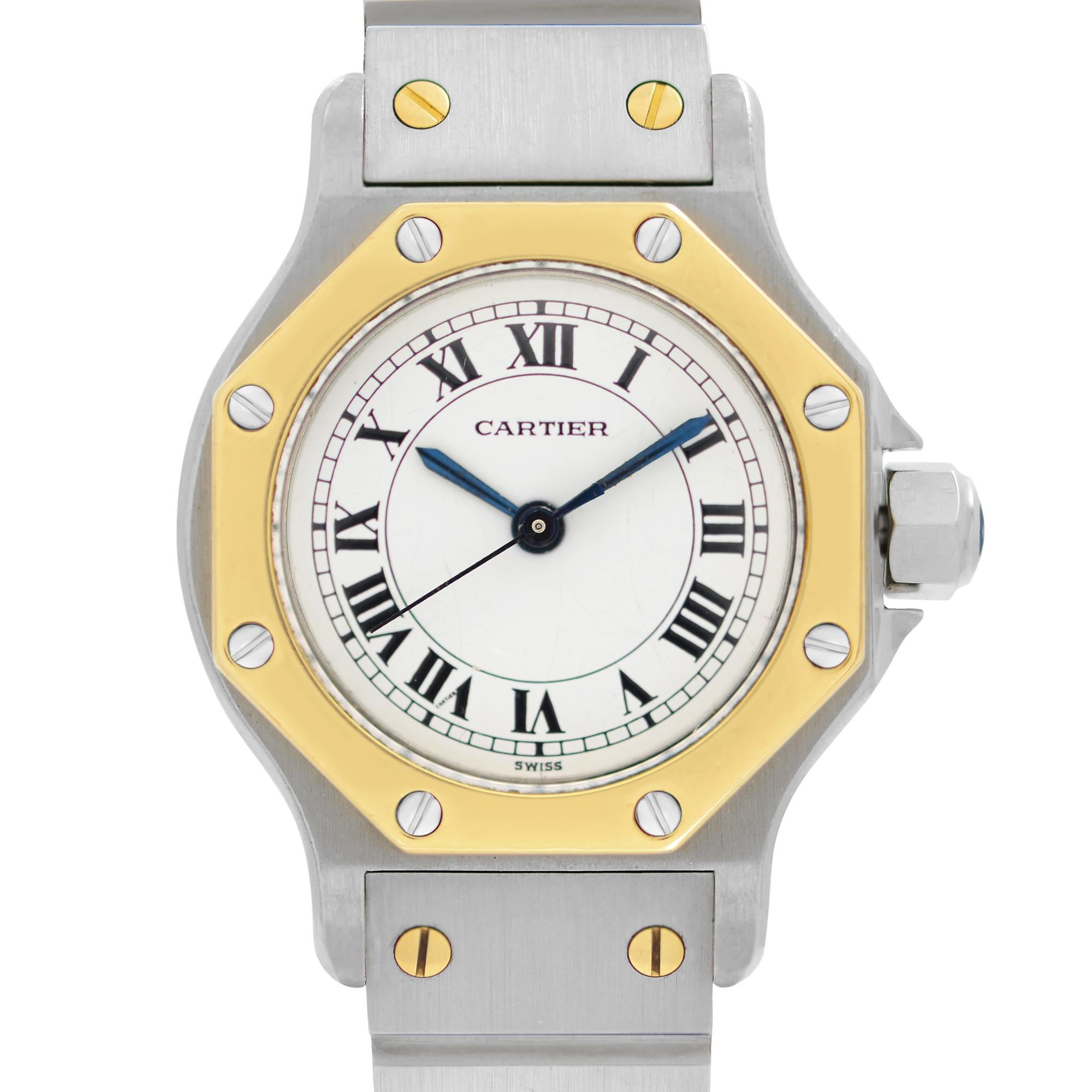 Pre-owned Vintage Cartier 0907 Santos Octagon Steel Yellow Gold Automatic Ladies Watch. Dial Shows Some Hairline Cracks Due to Age and Minutes and Hour Hands have minor patina as Seen in the Pictures. No Original Box and Papers are Included. Comes