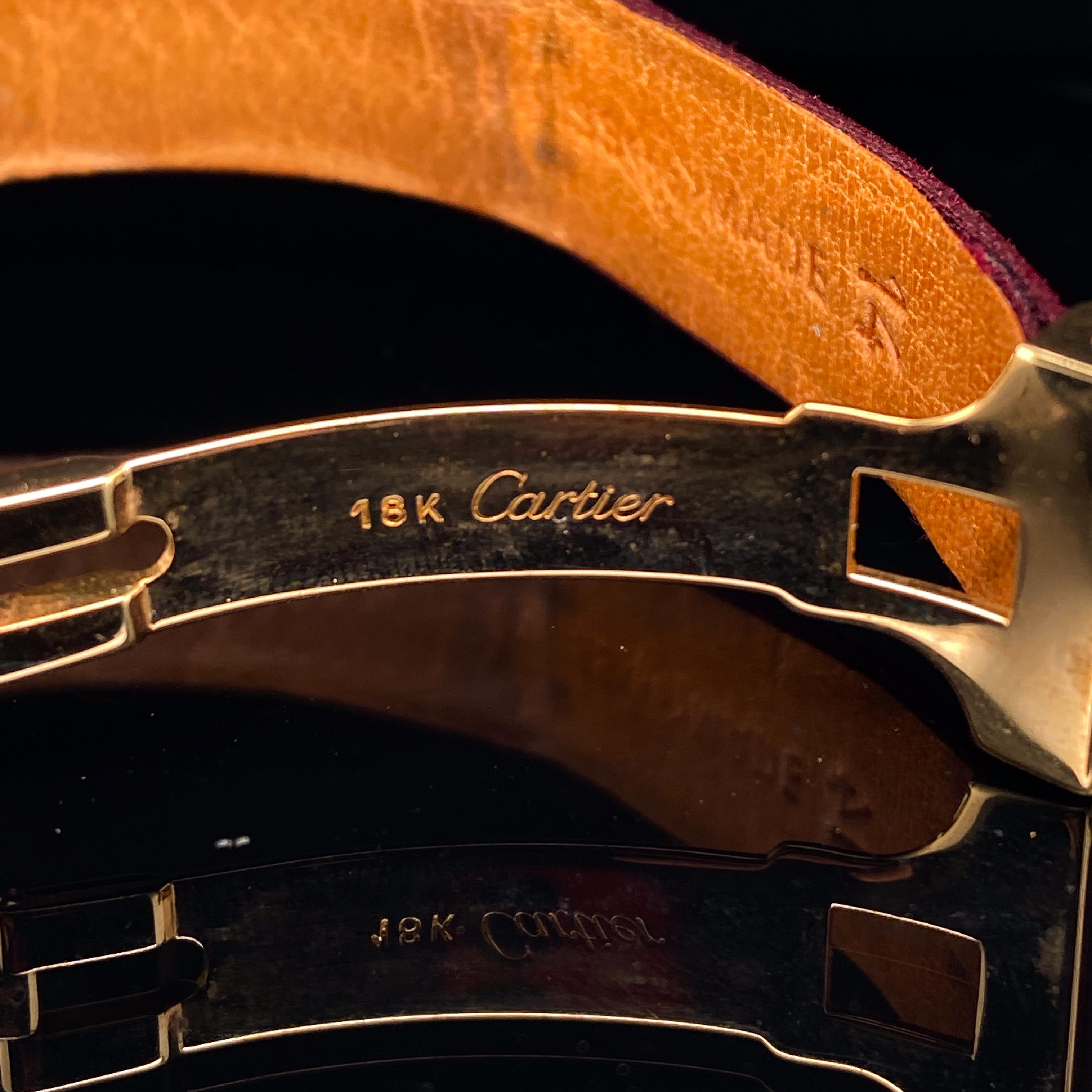Cartier Santos Ruby and Diamond 18 Karat Yellow Gold Manual Wind Wristwatch Circa 1980

A rare and unusual lady’s Cartier manual wind wrist-watch of 18 karat yellow gold. The bezel is set with two row of precious gemstones, the first row of