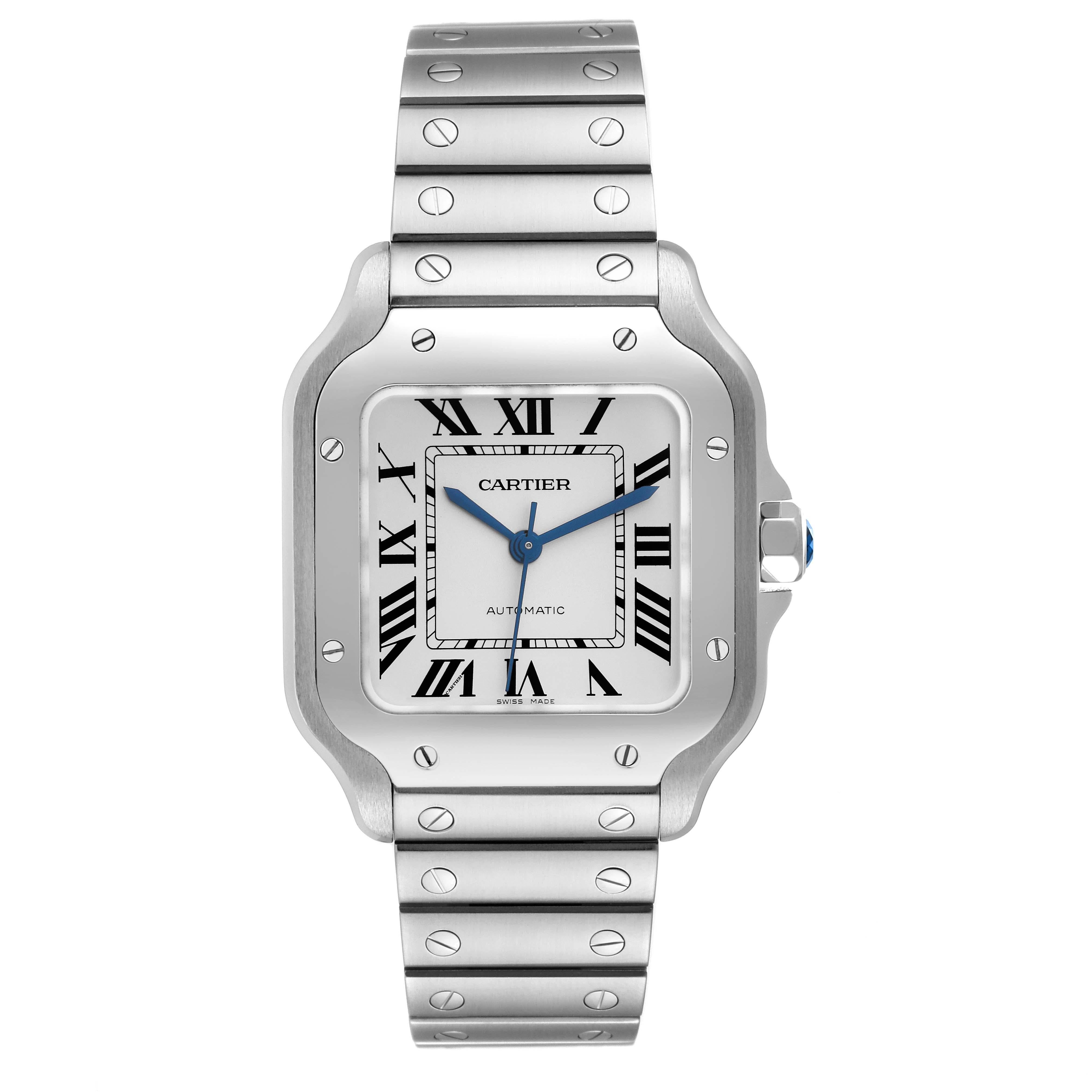 Cartier Santos Silver Dial Medium Steel Mens Watch WSSA0029 Card. Automatic self-winding movement. Stainless steel case 35.1 x 35.1 mm.  Octagonal crown set with the faceted blue spinel. Stainless steel bezel punctuated with 8 signature screws.