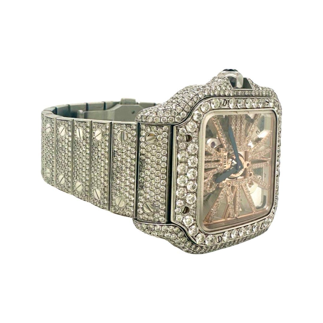 Brand: Cartier

Collection: Santos de Cartier Skeleton

Size: Large Model

Movement: Mechanical (Automatic)

Case Size : 40 mm

Stones: Approximately 25 carats of Diamond (VS2 clarity and G-H color) - Diamonds are set aftermarket

Case Material: